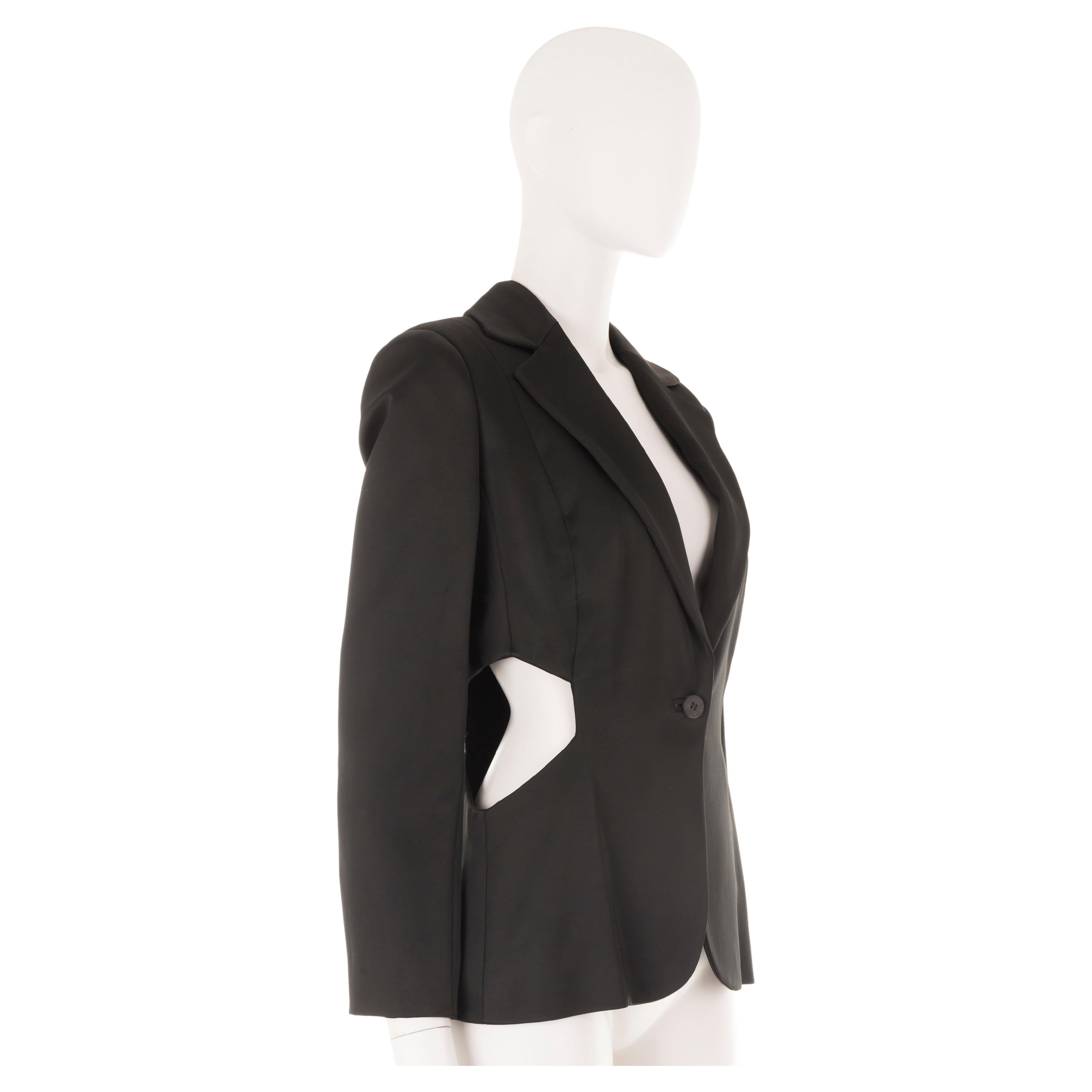 - Black structured blazer
- Double waist cut-out
- Padded shoulders
- Size M
