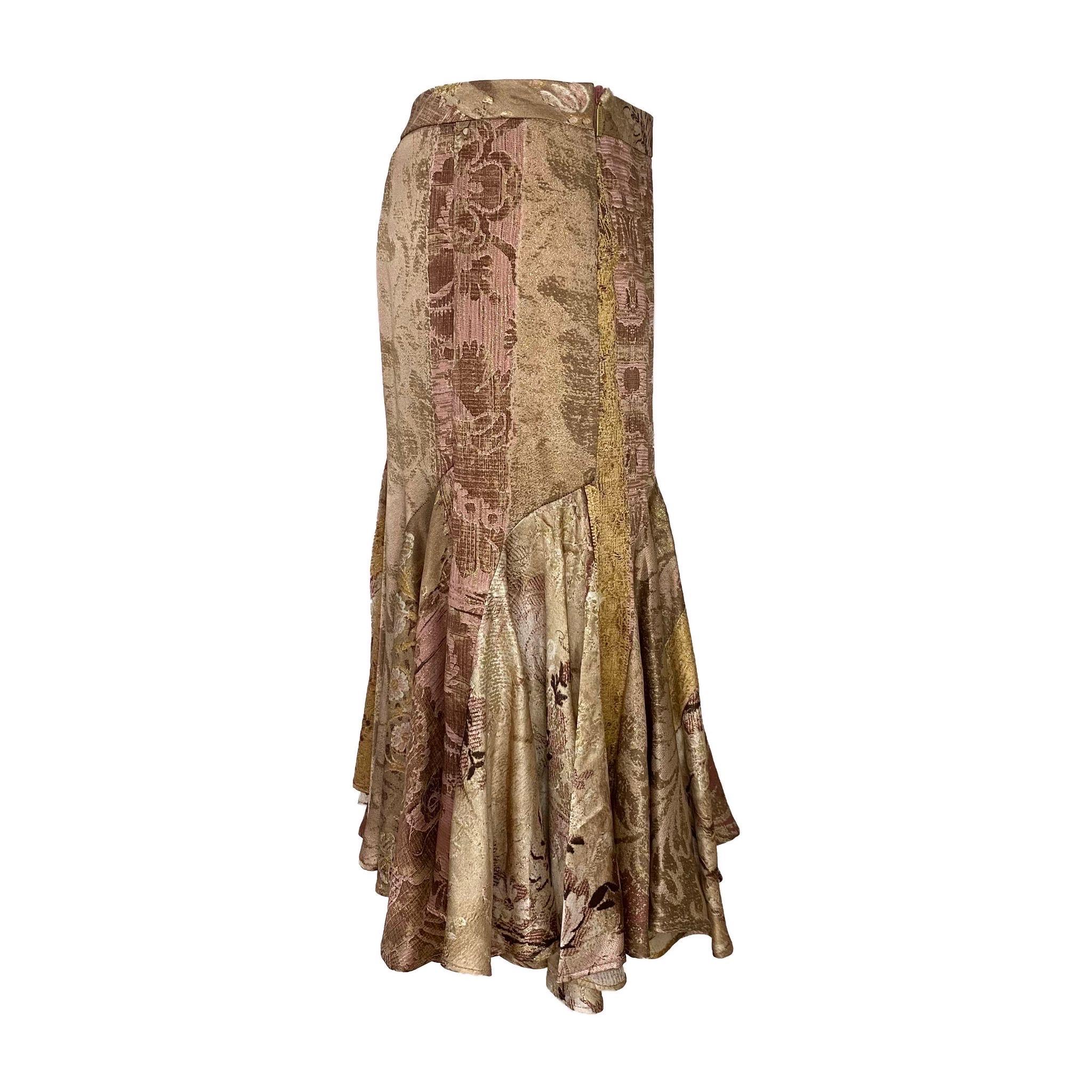 Roberto Cavalli godet midi skirt from Fall/Winter 2004 collection. Patchwork brocade print, 100% silk. 

Size 40
Waistline: 72 cm/ 28.3 inch
Length: 62 cm/ 24.4 inch