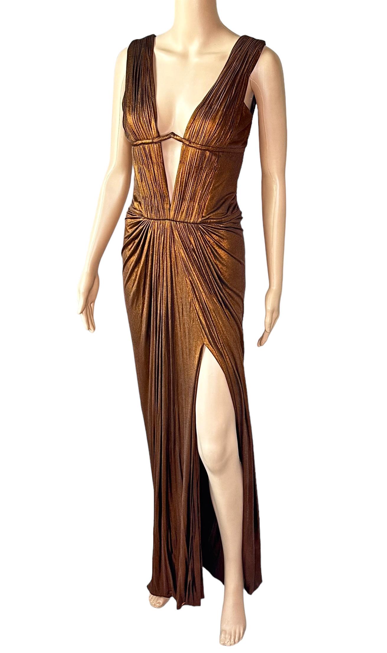 Roberto Cavalli F/W 2007 Metallic Plunging Neckline Open Back Evening Dress Gown 

Size IT 44

Roberto Cavalli metallic evening dress featuring gathering on the bodice, pleats throughout, deep plunging neckline, cutout back and concealed zip closure