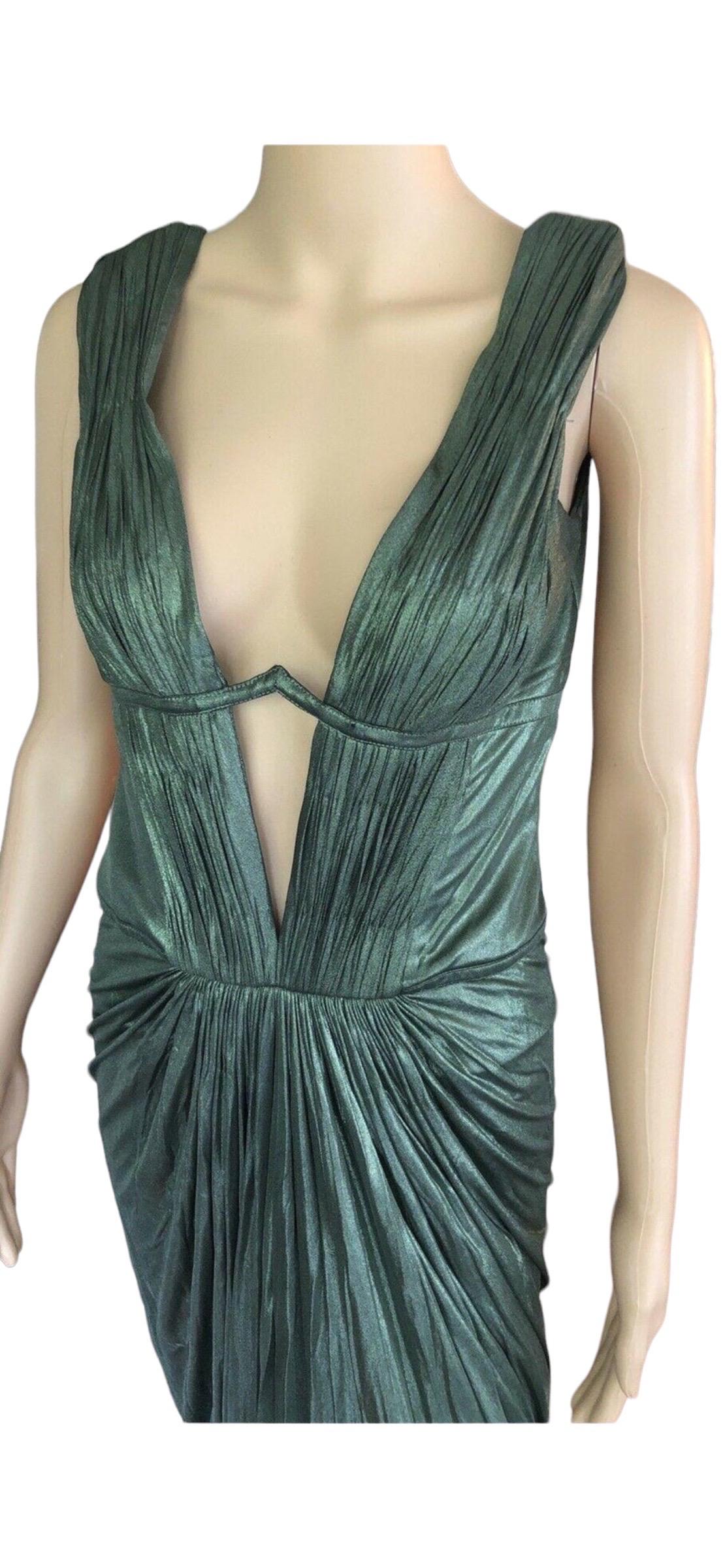 Roberto Cavalli F/W 2007 Runway Sexy Plunging Neckline Open Back Dress Gown IT 44

Look 43 from the Fall 2007 Collection. Roberto Cavalli green metallic evening dress featuring gathering on the bodice, pleats throughout, deep plunging neckline,