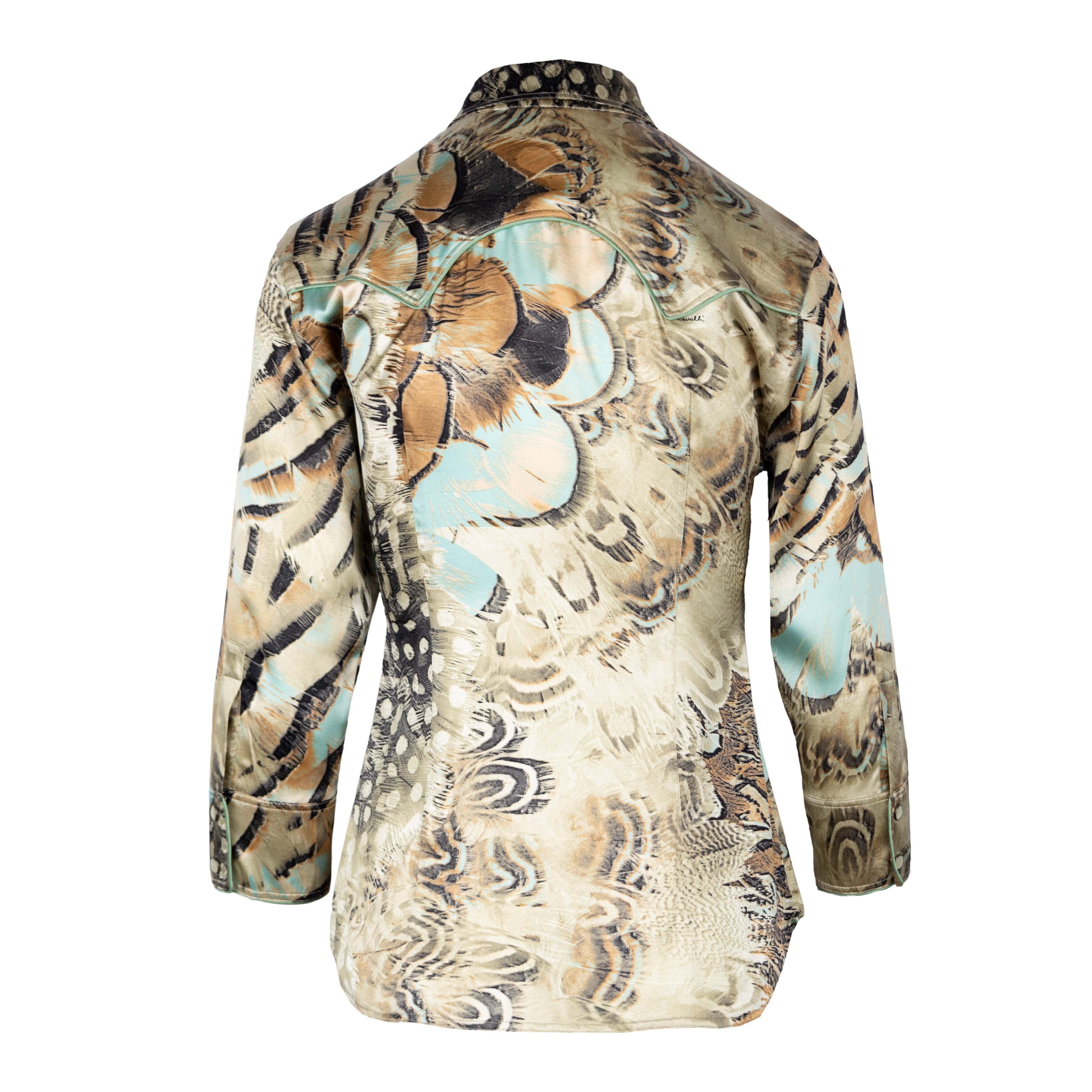 Roberto Cavalli cowboy shirt styled silk blouse with teal contrast piping on the two front pockets, button stand and cuff of the sleeves. The multi colored feather print was featured on the summer spring 2004 collection. The top has three-quarter