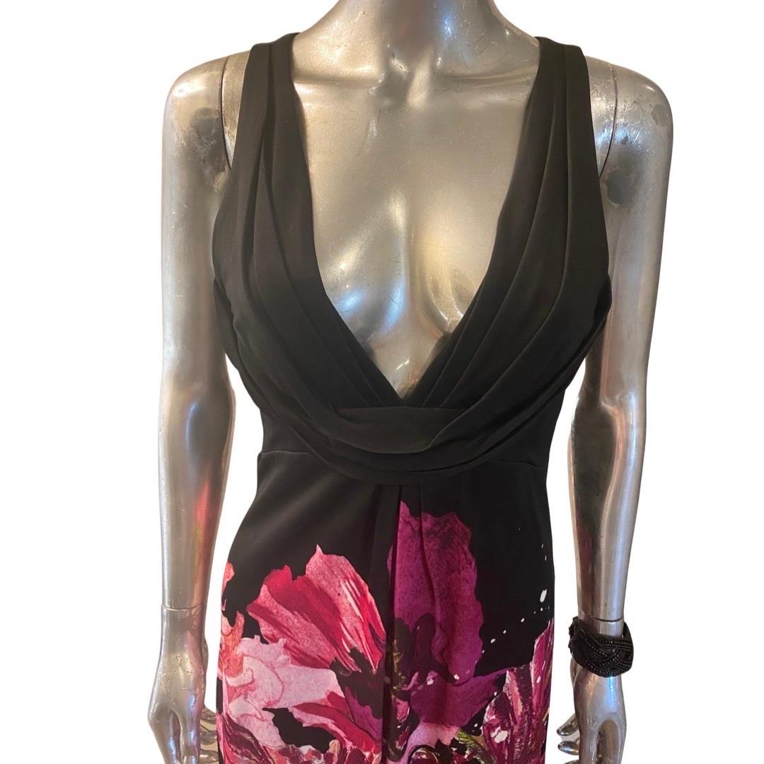 Roberto Cavalli sleeveless deep V neck line dress made in heavy weight fluid jersey made of rayon and nylon. Beautifully draped bodice and center pleat skirt. The dress was made in Italy. Size 44 Italian and size 8 US. This dress came from a Los