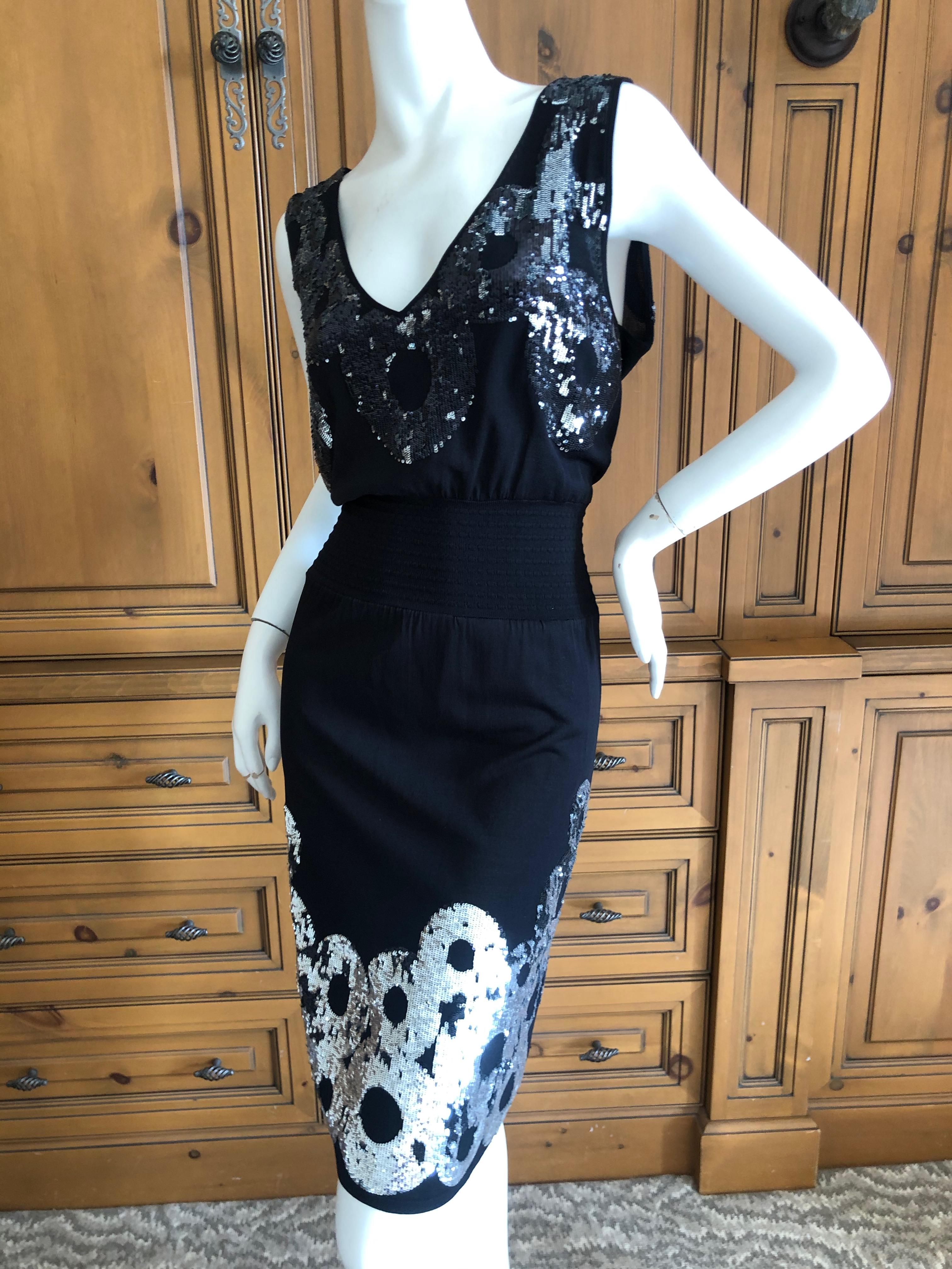  Roberto Cavalli Class Cavalli Sequin Little Black Knit Cocktail Dress.
There is a lot of stretch .
Size 42
 Bust 36