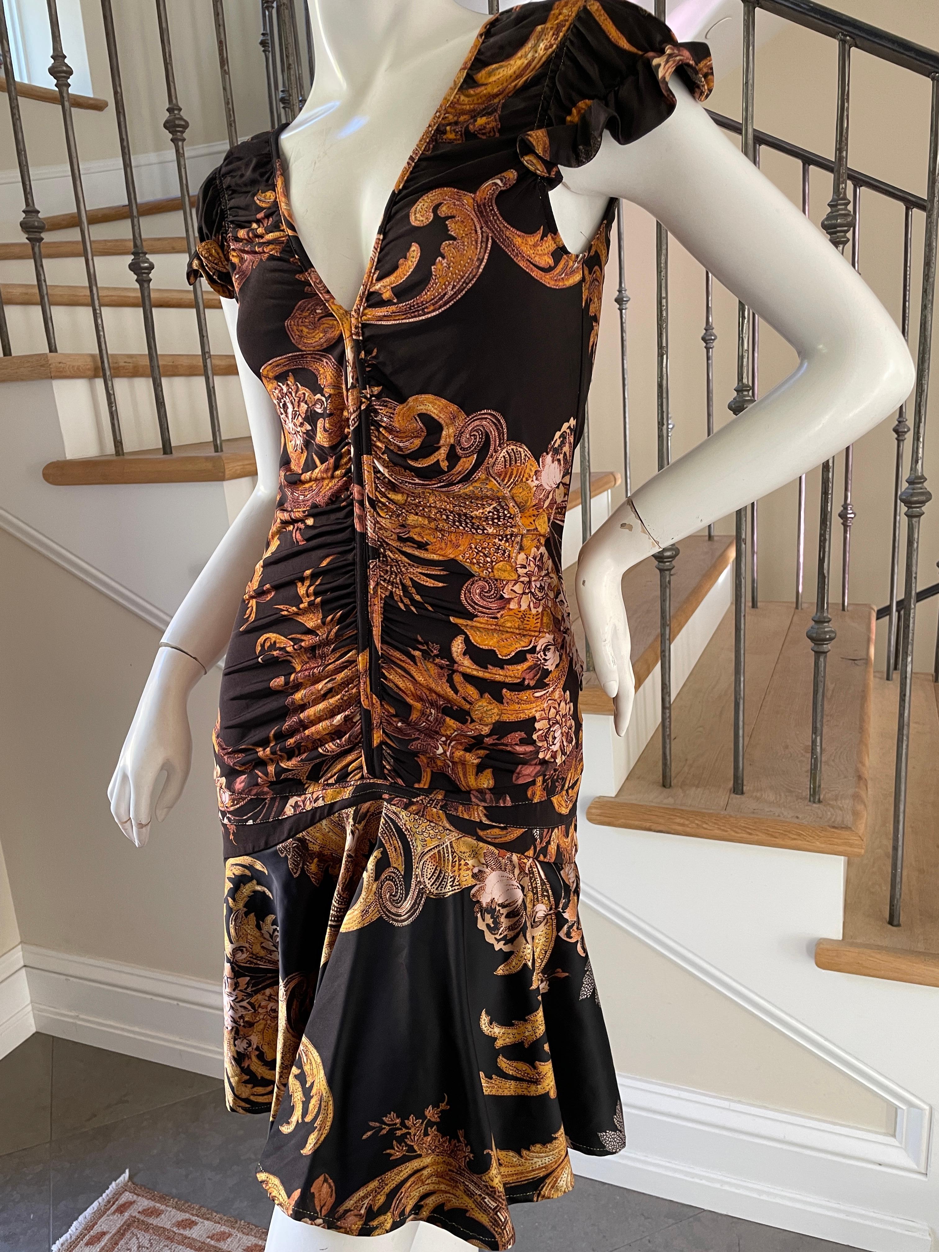 Just Cavalli Gold Baroque Pattern Low Cut Cocktail Dress by Roberto Cavalli
Size 44 Runs small
Bust 34