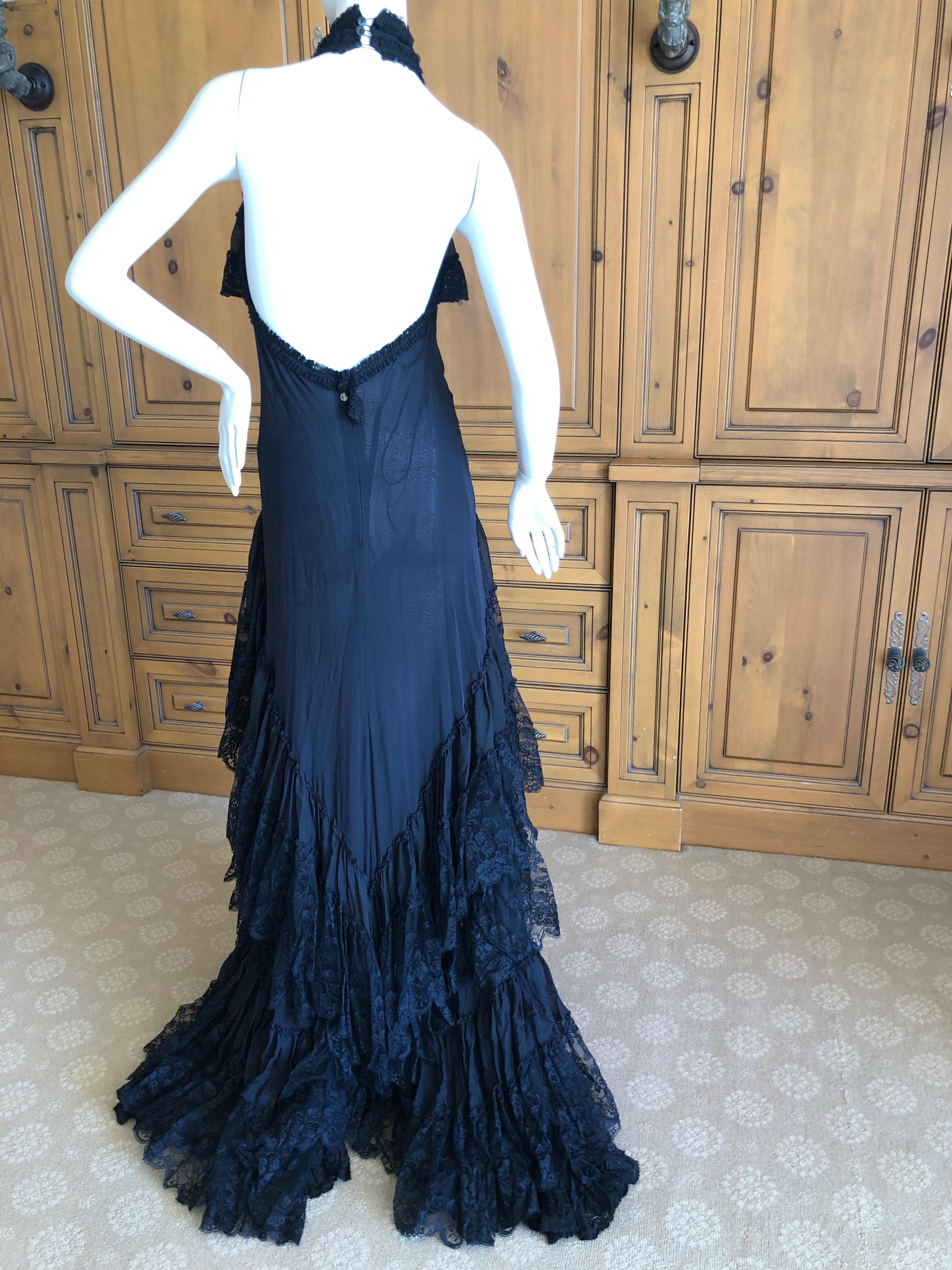 Roberto Cavalli for Just Cavalli Vintage Black Lace Layer Halter Dress.
So pretty
I show it with the skirt lining listed to show it sheer .
Zipper says Just Cavalli, labels are no longer on the dress
Size 8
 Bust 36