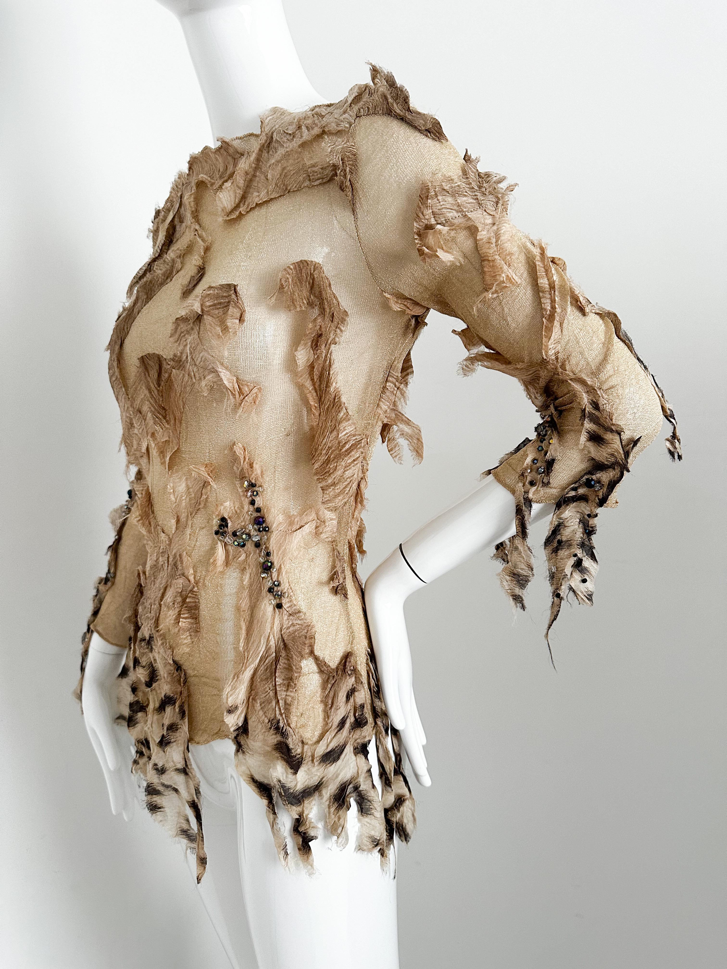 Iconic Roberto Cavalli FW 2001 top 
As seen on “Sex and the city” Season 4, Ep. 13

Rare and collectible item. It’s a wearable art. 
“Torn” look featuring silk pieces and beading throughout.

Marked size L, modeled on a size 2 mannequin and not