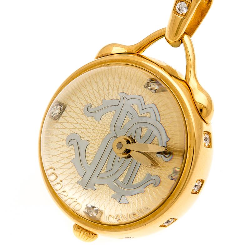 Be a proud owner of this limited find! Made from gold-plated stainless steel, this Roberto Cavalli watch comes in a circular shape. One side of it is textured while the other side has a dial covered by mineral glass. On the dial, there are four