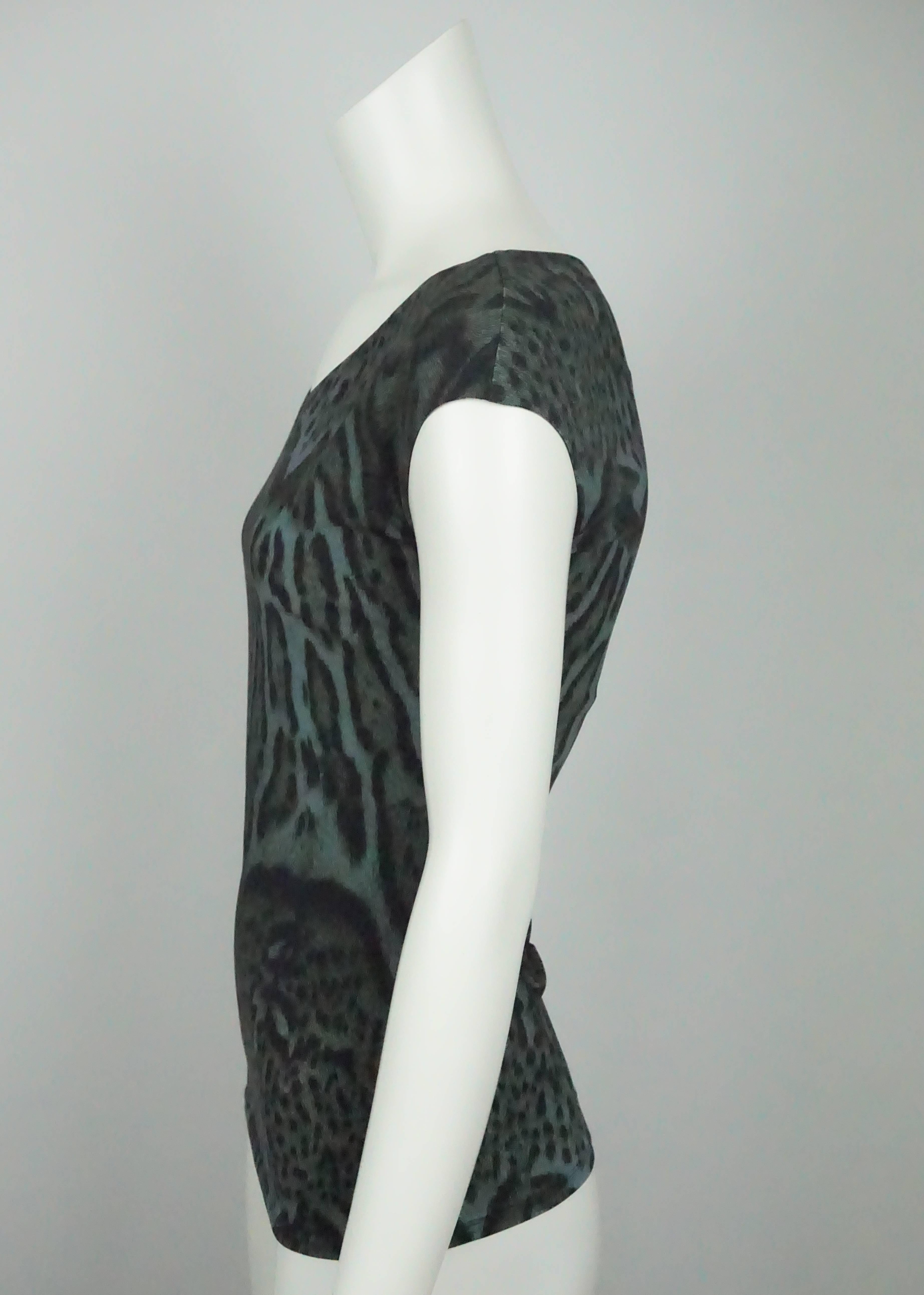 Roberto Cavalli Green Animal Print Sleeveless Top - 6  This simple elegant polyester and elastine top is in excellent condition. The top has a built in bra with no wire. There is a v neck and a slight cap sleeve. The top has a fitted cut and the