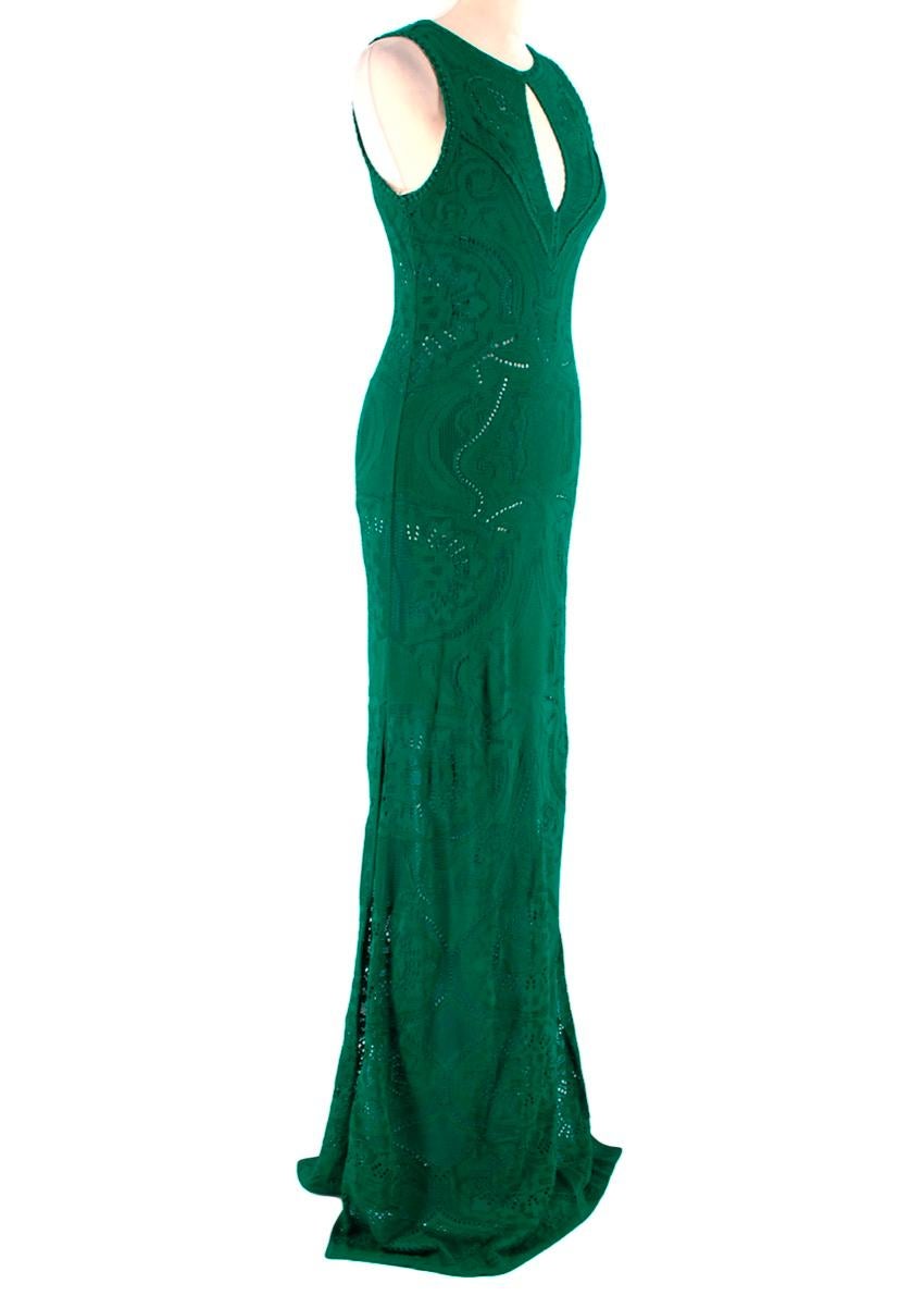 Roberto Cavalli Green Knit Lace Long Dress

-Rich emerald green color
-Detachable luxurious silk lining
-Silver logo hardware on the back
-Sleeveless design with split cleavage 
-Side splits 
-Button fastening on the back

Materials:

Main: 93%