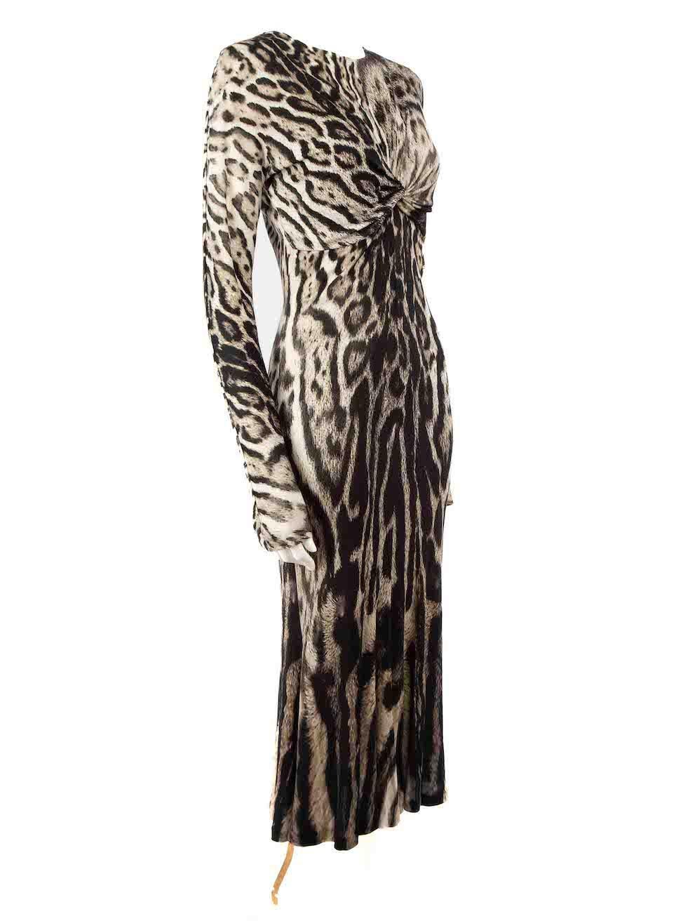CONDITION is Very good. Minimal wear to dress is evident. Minimal pull thread to back hemline on this used Roberto Cavalli designer resale item.
 
 Details
 Grey
 Viscose
 Midi dress
 Bodycon and stretchy
 Leopard print pattern
 Round neckline
