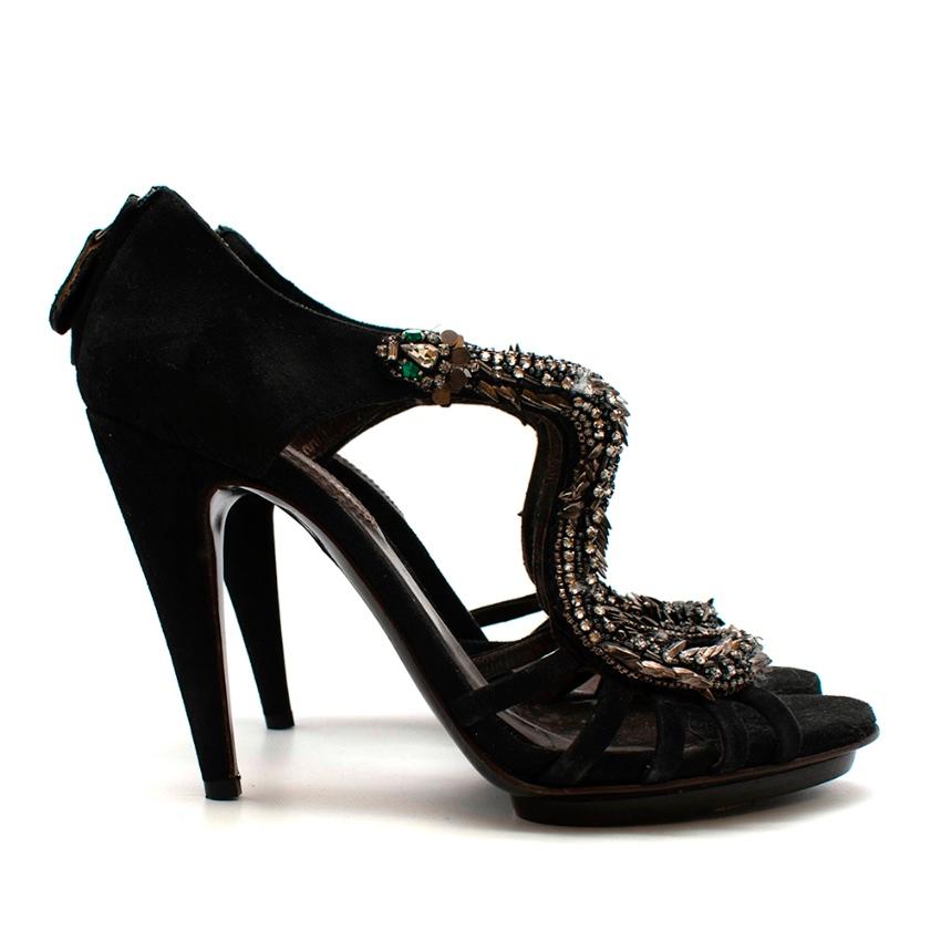 Roberto Cavalli Black Suede Leather Heels with Snake Embelishment 

- Open Toe 
- Black Tone Heel 
- Suede Upper Sole 
- Matching Outer Insole With Embellished Trim 
- Roberto Cavalli Silver Hardware
- Rear Outer Zip

Made in Italy 

Length: 26cm