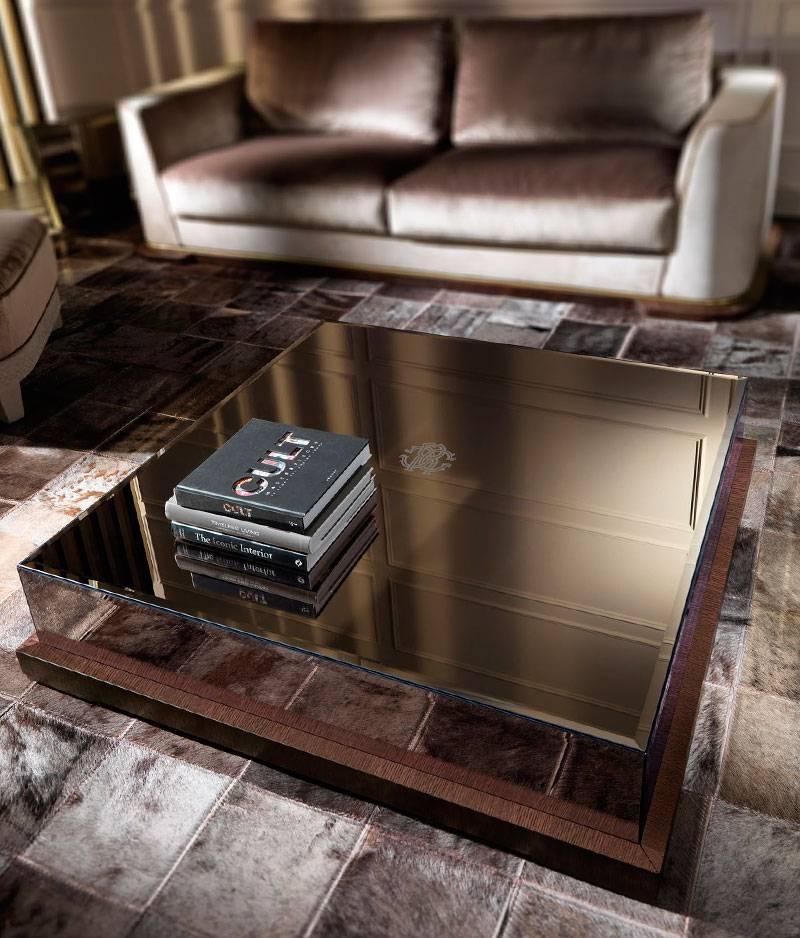 Central table with multi-layer wood structure. Bevelled bronze mirrors and polished wengè oak base. Sand-blasted Roberto Cavalli logo on top.