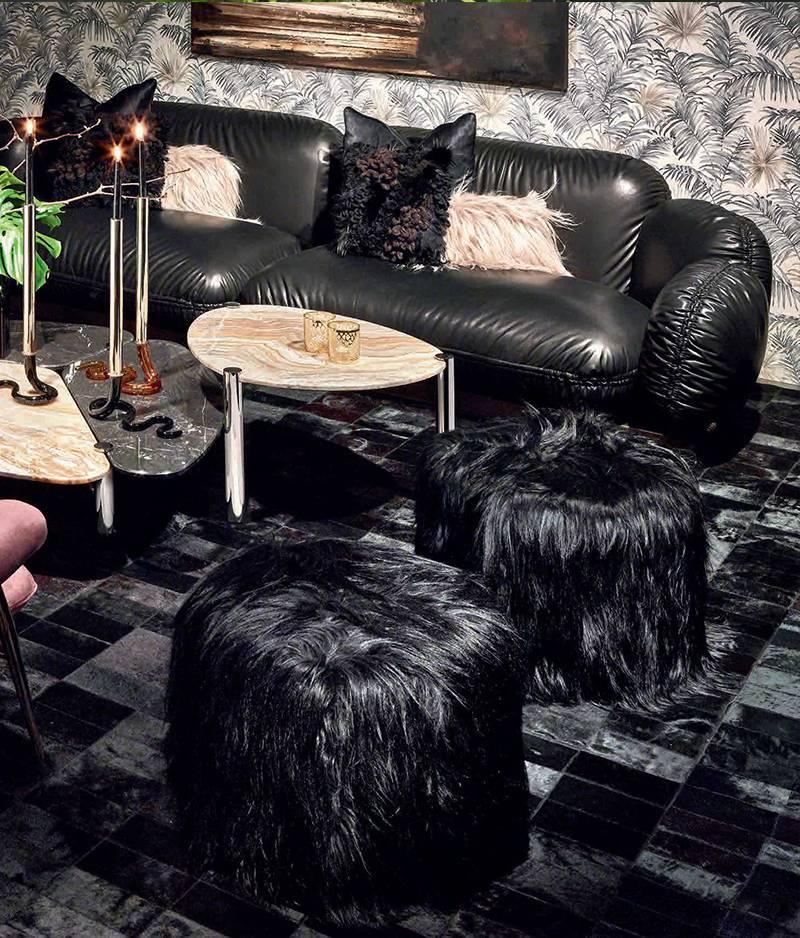 Sofa with metal and foam structure. Upholstery in black leather sauvage with optional back cushions in Uma quilted black leather sauvage. Metal base in brushed dark bronze finishes.
