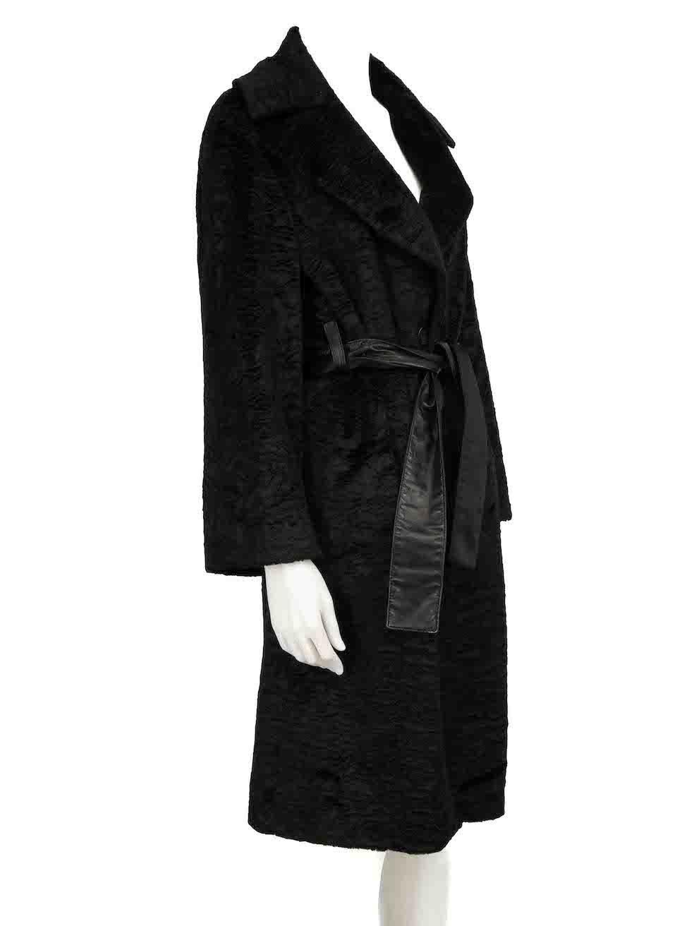 CONDITION is Very good. Hardly any visible wear to coat is evident on this used Just Cavalli designer resale item.
 
 
 
 Details
 
 
 Black
 
 Viscose
 
 Coat
 
 Leather belt
 
 Single breasted
 
 Belted
 
 2x Side pockets
 
 
 
 
 
 Made in Italy
