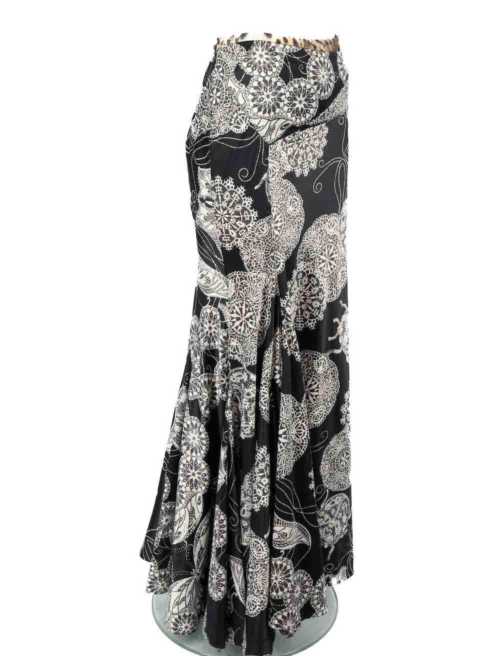 CONDITION is Very good. Minimal wear to skirt is evident. Minimal wear to the front and back with small pulls to the weave on this used Just Cavalli designer resale item.
 
 Details
 Black
 Polyester 
 Skirt 
 Maxi 
 Lace print
 Flared hem
 Back zip