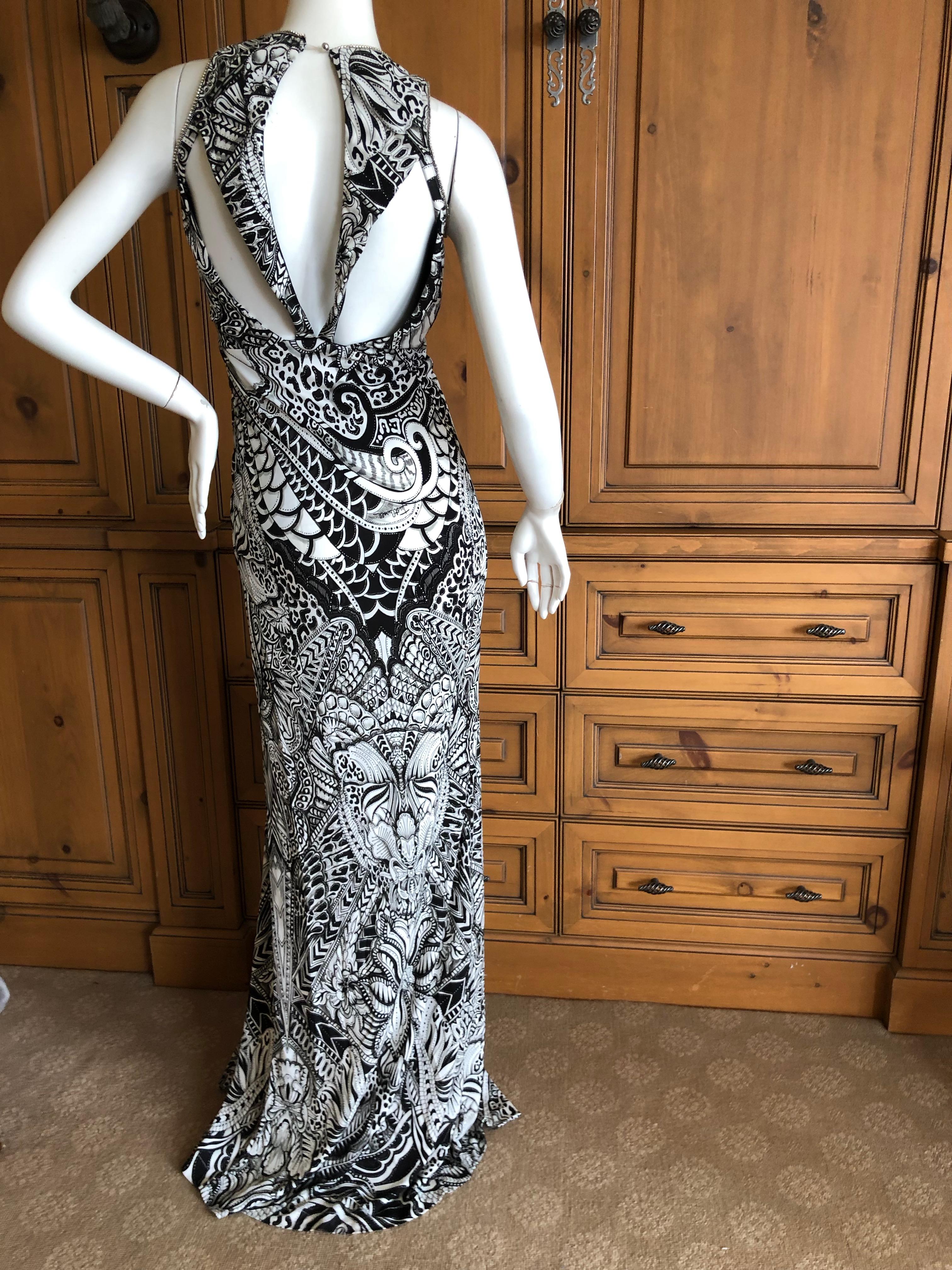 Roberto Cavalli for Just Cavalli Crystal Trimmed Low Cut Graphic Evening Dress
Wonderful colors, there is a lot of crystal which doesn't show well in the photos.
So pretty
Size 38, there is a lot of stretch
 Bust 36