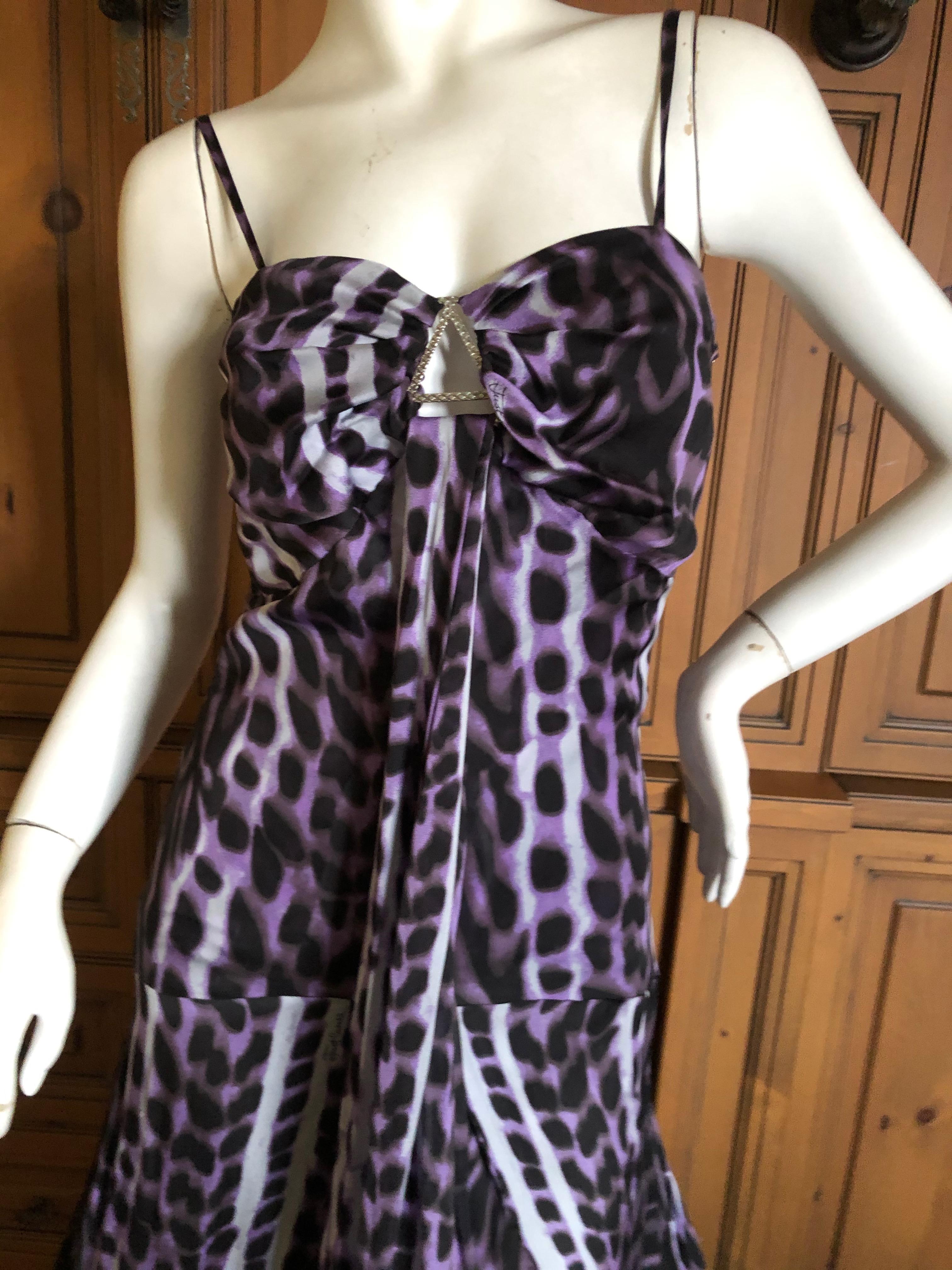  Roberto Cavalli Just Cavalli Leopard Print Silk Evening Gown with Long Weighted Hem .
Keyhole bust details, with a small matching scarf included.
This is so pretty, there is a heavy banded hem that makes this flow in every direction.
Size 40
Bust