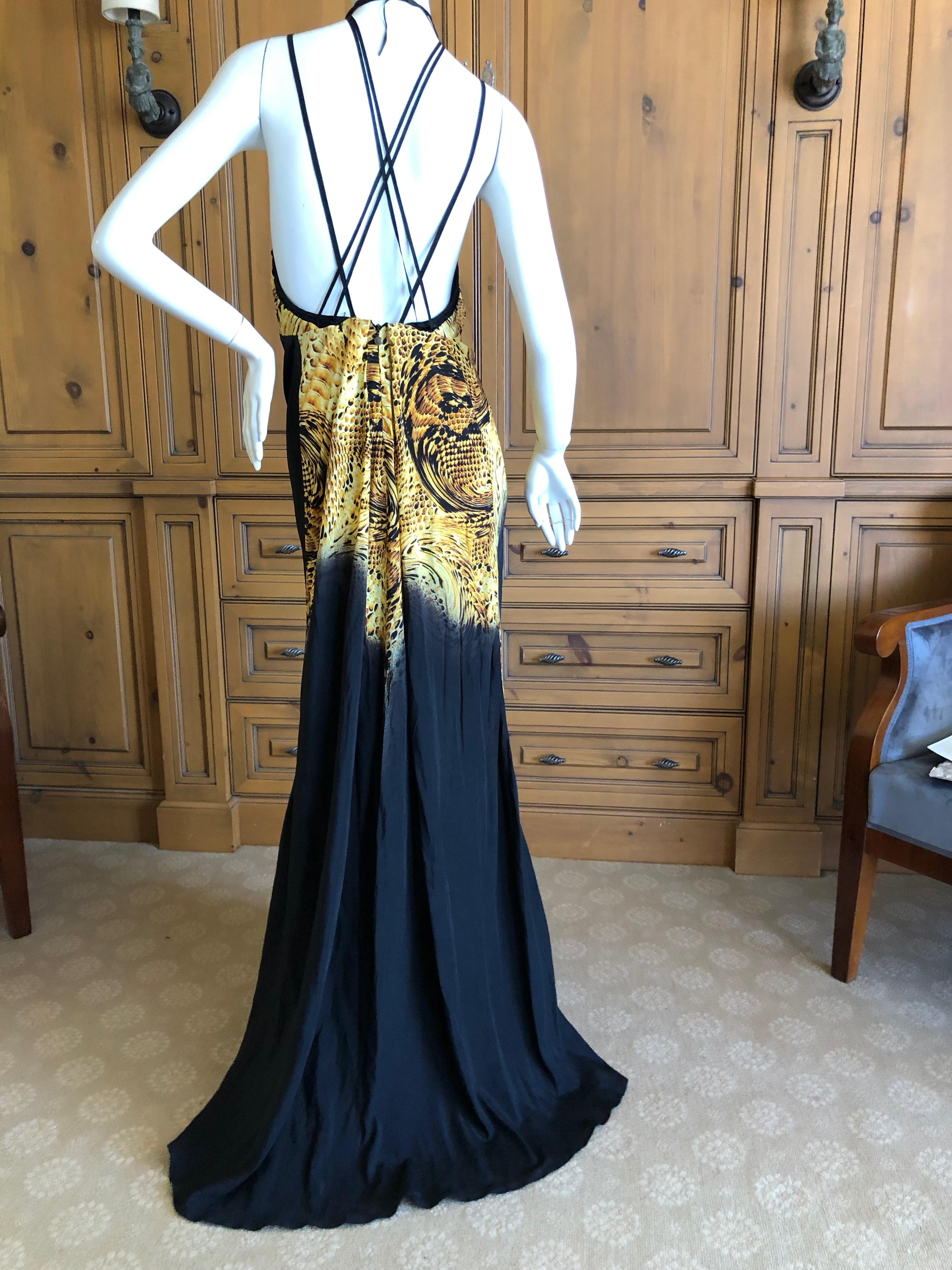 Roberto Cavalli for Just Cavalli Vintage Backless Halter Style Evening Dress.
So pretty, the ties on the back I'm not certain how they were styled.
Size 40
Bust 34