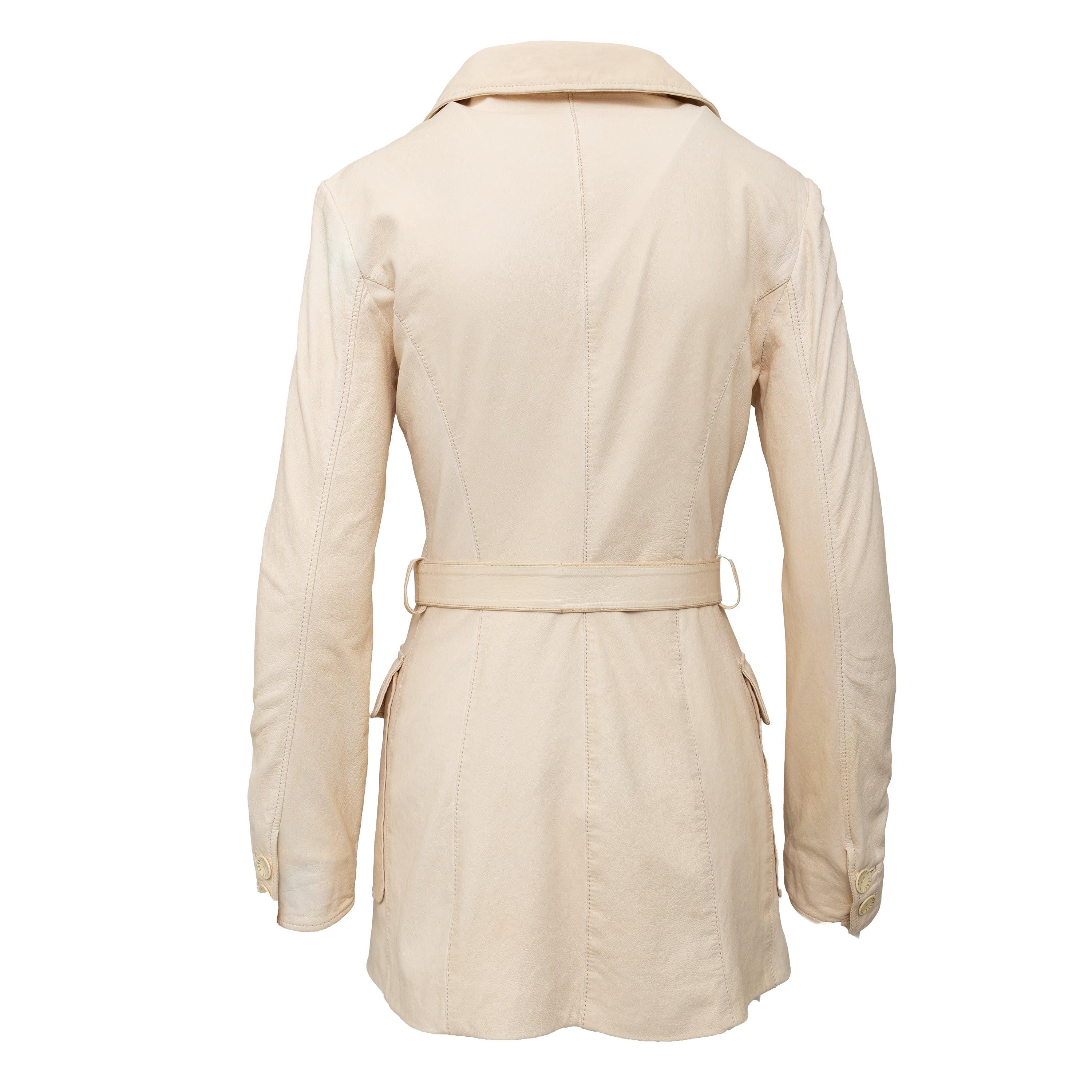 Expertly crafted from soft nappa leather, this Roberto Cavalli jacket is the epitome of luxury. In a light beige hue, it features front flap pockets and logo embossed buttons. The buckled belt at the waist provides a flattering, cinched-in