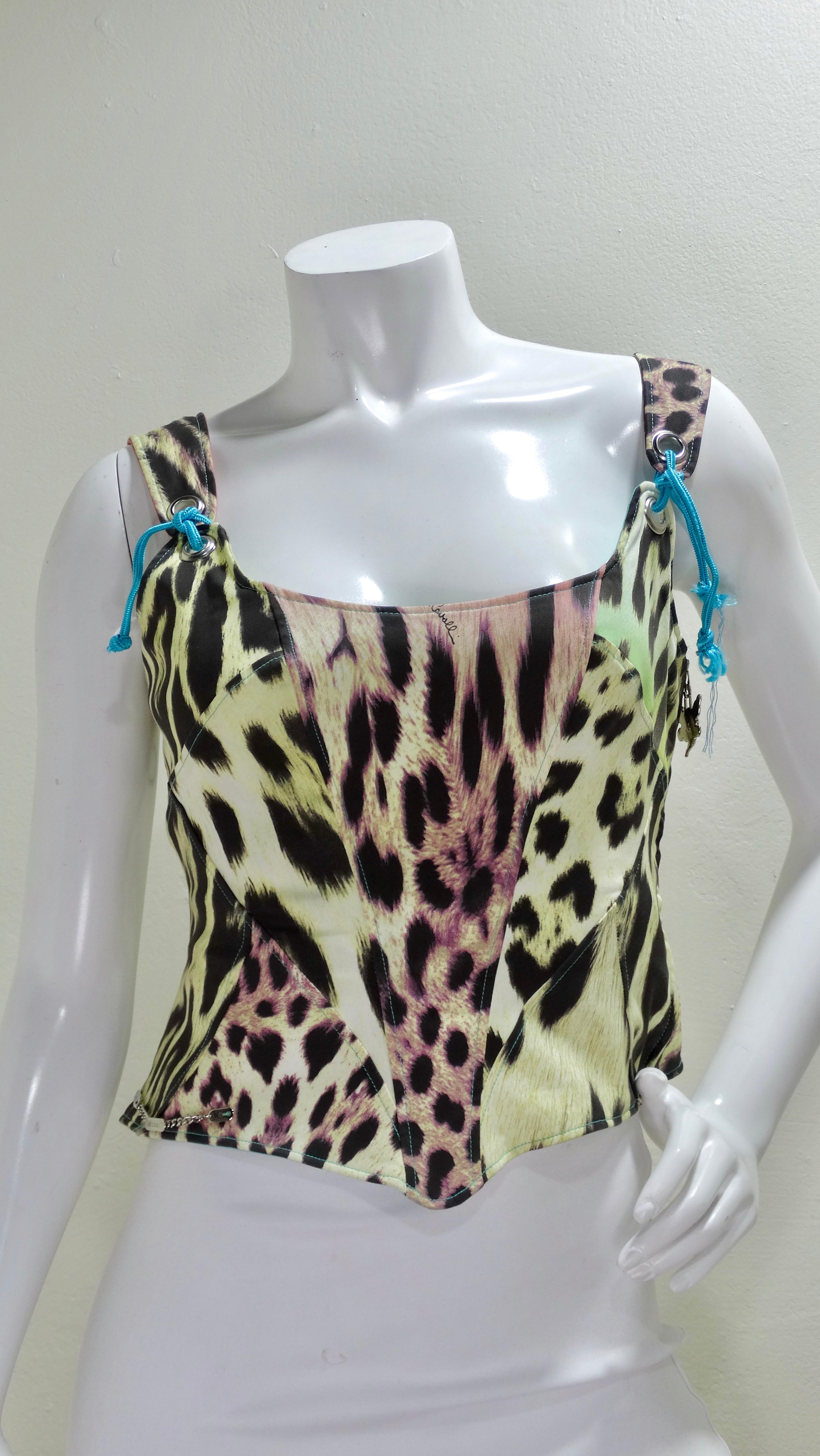 Bring out your edgy side with this Just Cavalli multicolor mixed animal print bustier top. This top's fit is almost completely customizable as it features a lace up back, adjustable shoulder ties, soft boning, as well as a full zipper side. Don't