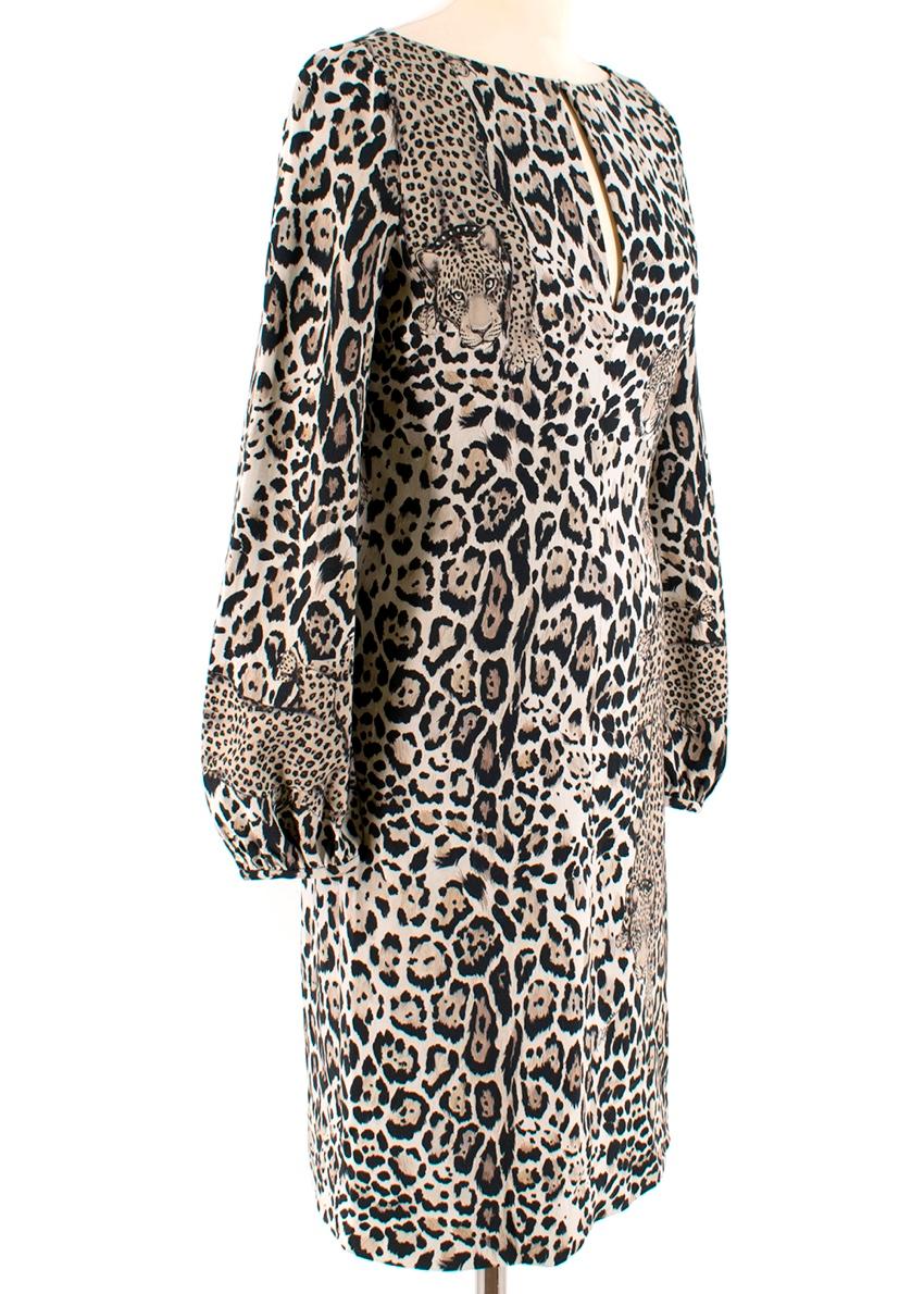 Robert Cavalli Leopard Knee Length Dress

- Leopard print/faces
- Darted chest
- Fully lined
- Back zip
- V-neck with hook clasp to become keyhole
- Knee length
- Mid weight
- Subtle flare
- Balloon sleeves

Materials:
Main:
- 95% Viscose
- 5%