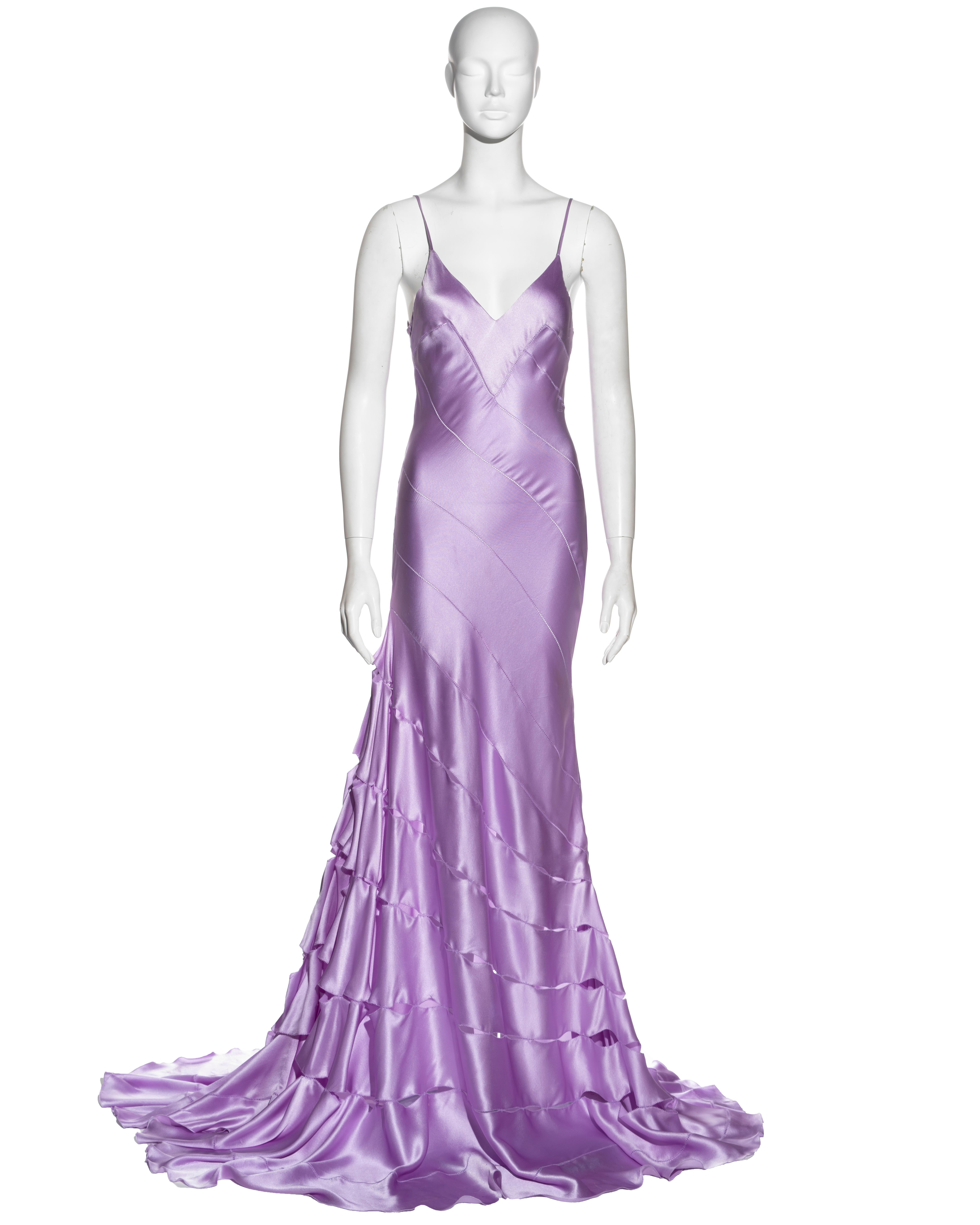 ▪ Roberto Cavalli evening dress
▪ Constructed from multiple bias-cut silk panels 
▪ V-neck 
▪ Spaghetti straps 
▪ Floor-length skirt with train 
▪ The seams of the skirt have regular openings which bare the skin of the wearer 
▪ Size Small
▪