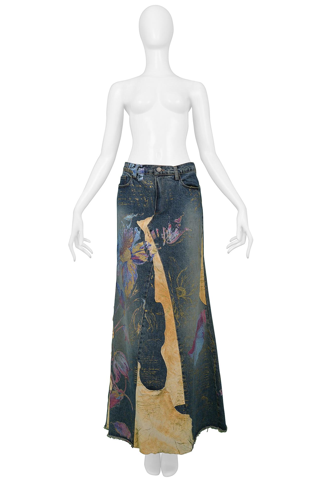 Resurrection is pleased to offer a vintage Roberto Cavalli blue denim patchwork skirt featuring natural leather raw edge patches, hand-painted floral print, a sexy center back slit, and maxi length. 

Roberto Cavalli
Size Medium
Fabric Cotton Denim