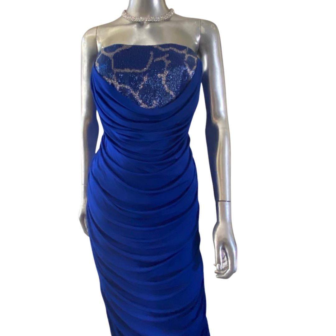 This Roberto Cavalli gown was designed specifically for Mary J Blige to wear at a concert in Italy and was produced in a very limited quantity for Cavalli boutiques in Italy. A very special royal blue imported draped jersey gown with hand beaded