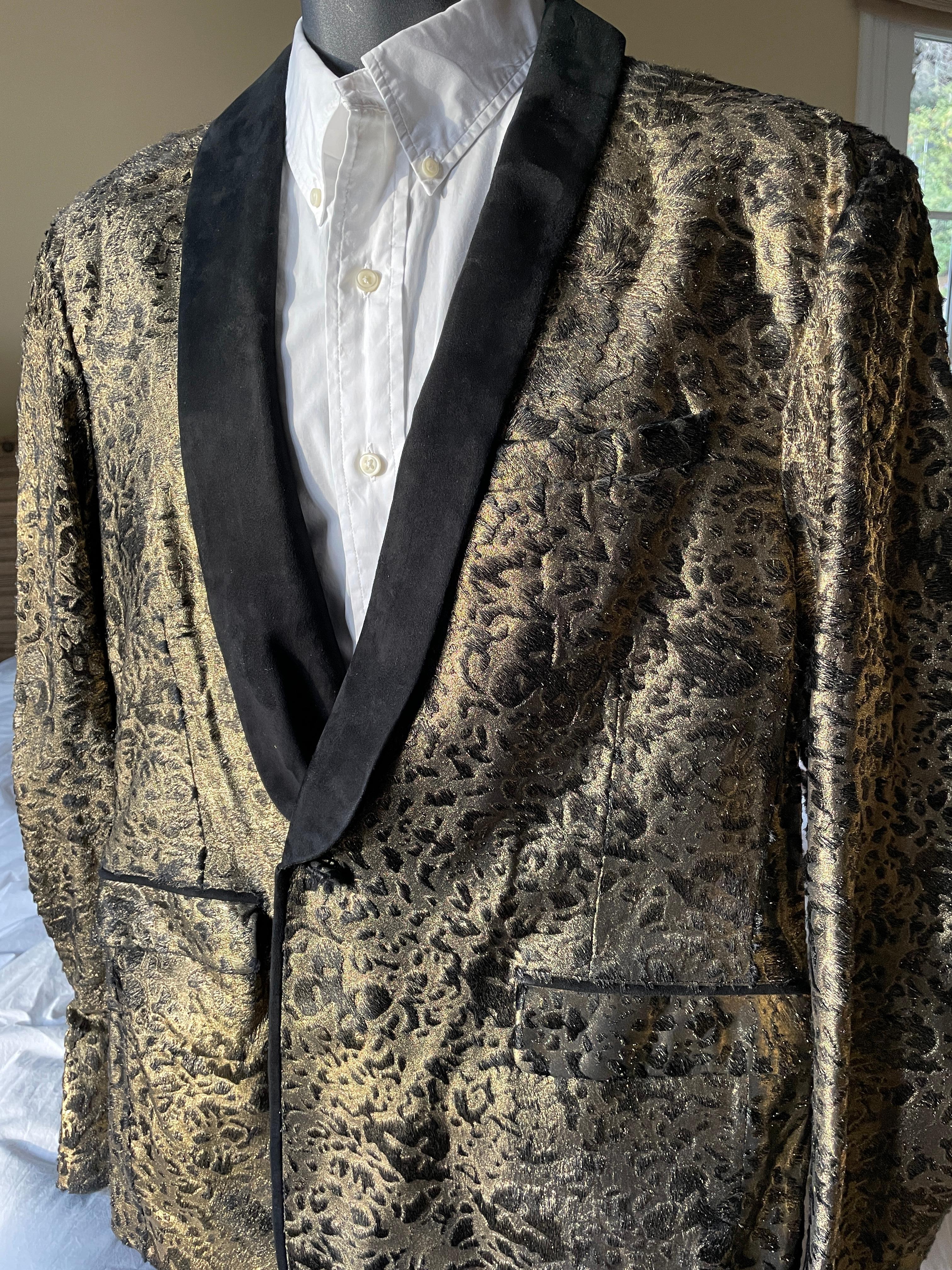 Roberto Cavalli Gold Brocade Leopard Pattern Evening Jacket with Suede Shawl Collar.
This is pony, a treated leather to create this amazing gold leopard pattern
Trimmed in suede details.
New with tags, retail is $7775
This is such a magnificent