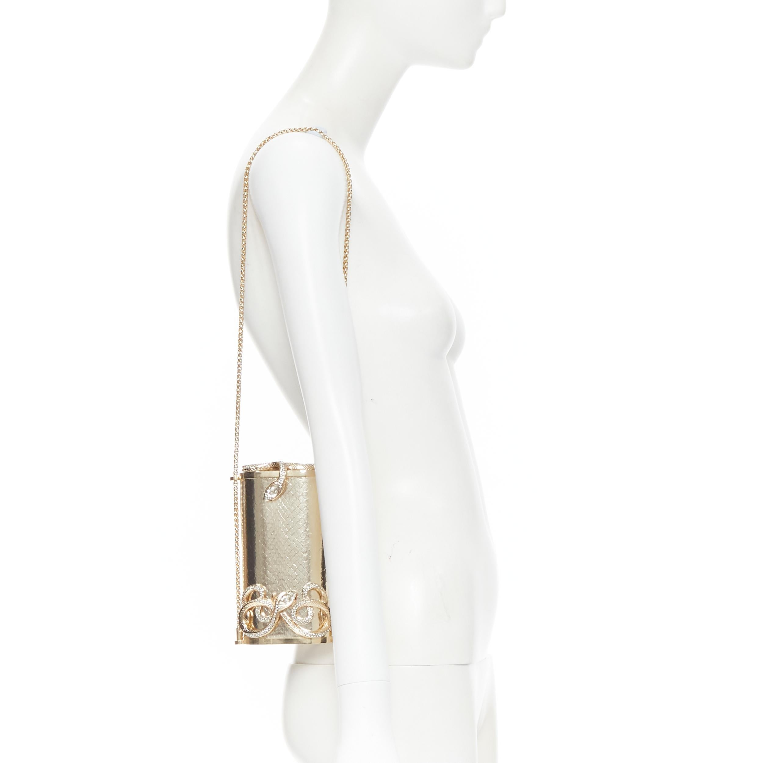 ROBERTO CAVALLI metallic gold leather crystal Serpent snake chain box clutch 
Reference: TGAS/B01438 
Brand: Roberto Cavalli 
Designer: Roberto Cavalli 
Model: Crossbody box clutch 
Material: Metal 
Color: Gold 
Pattern: Solid 
Closure: Clasp 
Extra