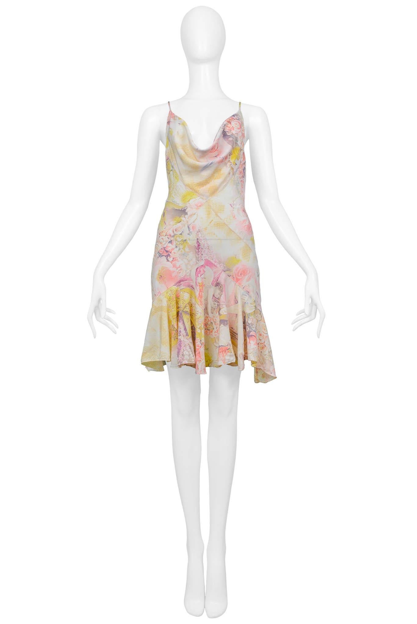 Resurrection Vintage is excited to present a vintage Roberto Cavalli angel and rose print silk mini slip dress featuring a plunging neckline, skinny straps, exposed back, front and back flounce, metallic threads, open stitch seaming, and mini