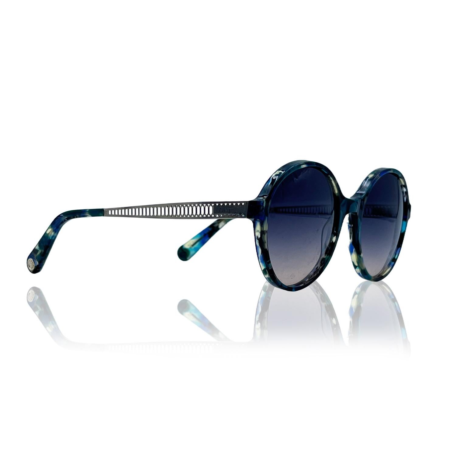 Roberto Cavalli Eyeglasses- Model: RC5088 - 055. Blue acetate frame with silver metal ear stems. Blue gradient lenses. Round design. Made in Italy.


Details

MATERIAL: Acetate

COLOR: Blue

MODEL: RC5088

GENDER: Women

COUNTRY OF MANUFACTURE: