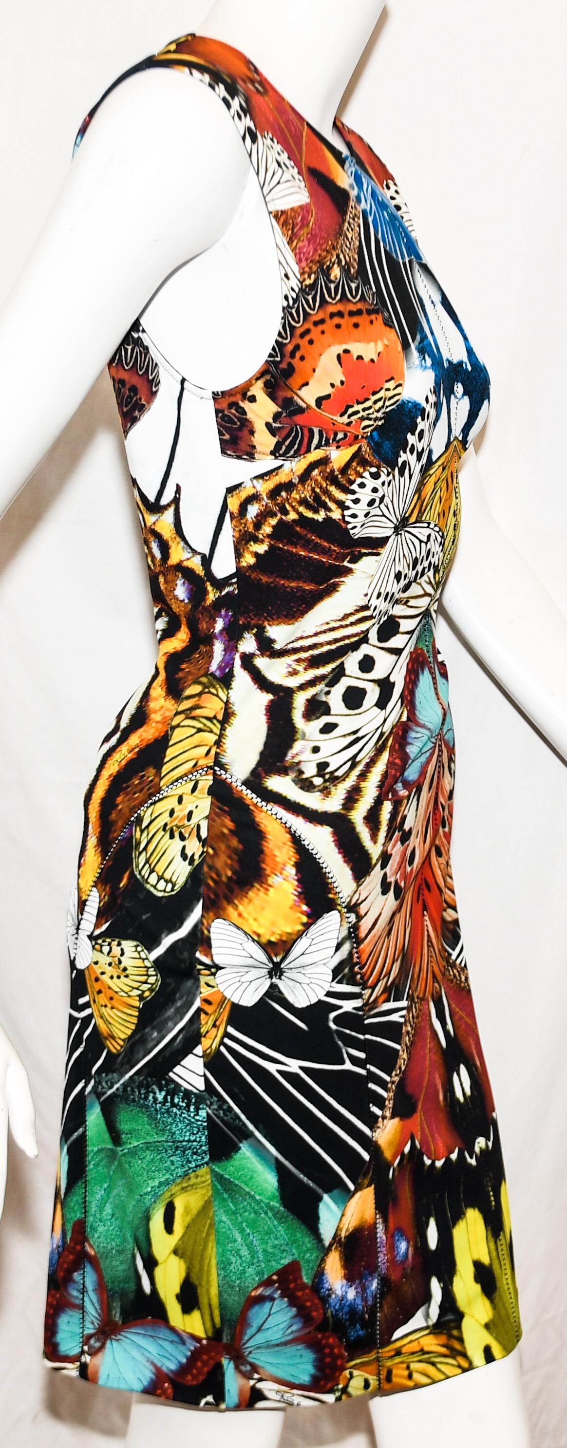 Roberto Cavalli dress features sleeveless design, a multicolor butterfly print, and hidden zipper at back.  Unlined.  Excellent Condition.  Made in Italy.  