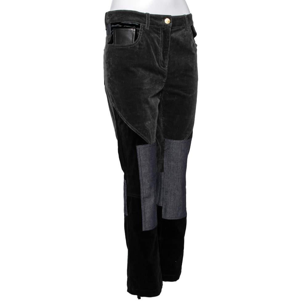 Elevate your fashion game with these corduroy pants from Roberto Cavalli. The multicolored pair stands out with its unique design and denim patches on the front and back. It is finished with zippers at the back legs and external pockets. 