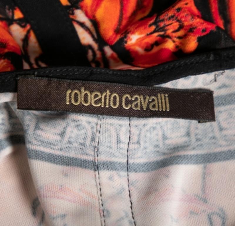 This gorgeous top by Roberto Cavalli will surely elevate your wardrobe. Crafted from quality materials, it comes in a multicolored print that is one of a kind. The top features long sleeves, a relaxed silhouette, and a sophisticated boat neck. Pair