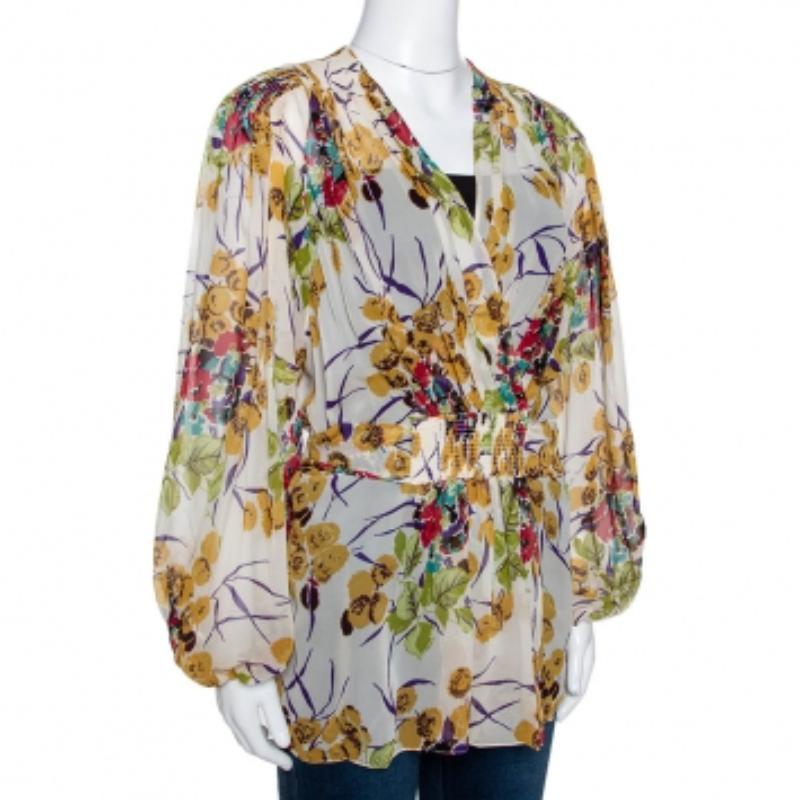 Comme cette blouse multicolore de Roberto Cavalli est ravissante ! Il est en soie et présente un imprimé féminin sur toute sa surface. Elle présente des manches longues, un décolleté en V profond et une silhouette faussement enveloppante. La jolie