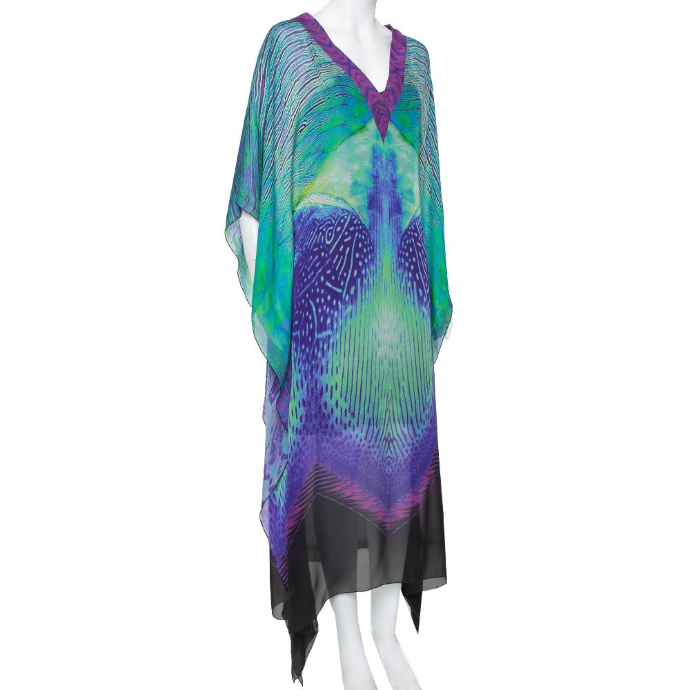 This kaftan from Roberto Cavalli is a holiday staple; it is tailored with pure silk to a long length and can be carried in your luggage using minimum space. The kaftan has multicolored hues and a lovely print all over. It has a deep v-neckline and a