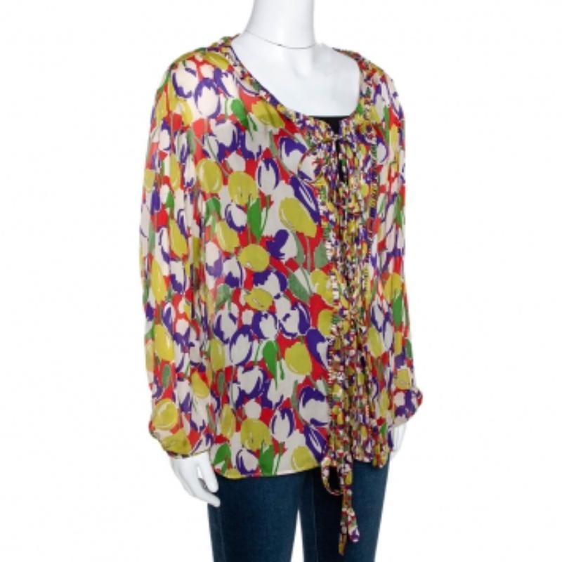 Sfoggia uno stile femminile con questa blusa della casa Roberto Cavalli. Progettato in una struttura semplice con maniche lunghe e un dettaglio elegante sul davanti, il top, realizzato in seta, presenta una stampa a tulipano su tutta la superficie.