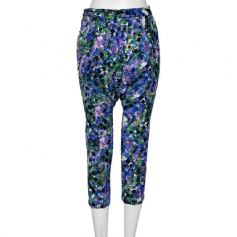 These Roberto Cavalli pants are truly luxurious with their multicolored print and stylish draped silhouette. Complete with a button closure and pockets, it is just the pair to add to your wardrobe!