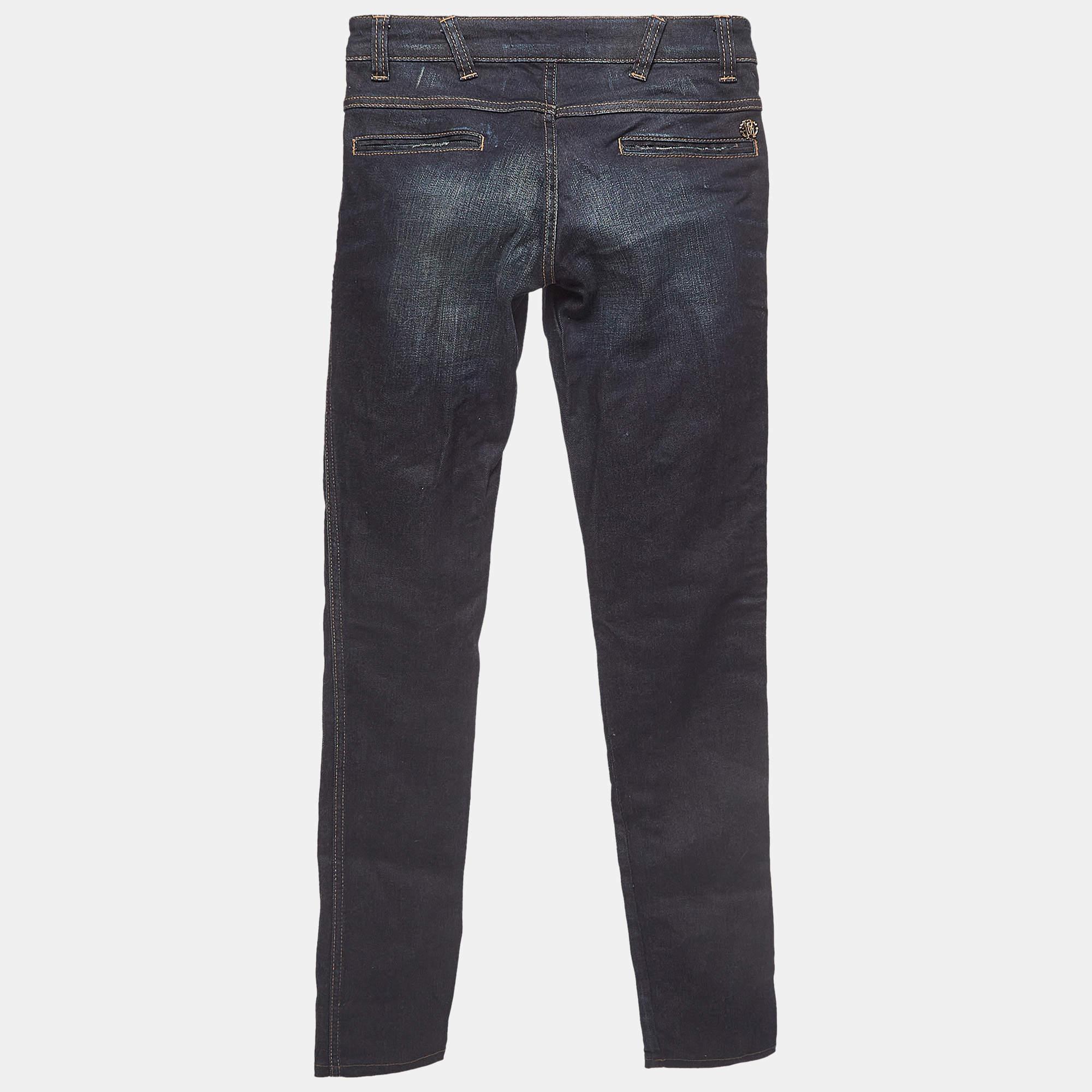 Nothing is more chic than a pair of jeans that elevate your style. Designed by Roberto Cavalli this jeans exhibit a rich shade and feature an elegant style. Your casual style is about to look luxurious as you wear these jeans.