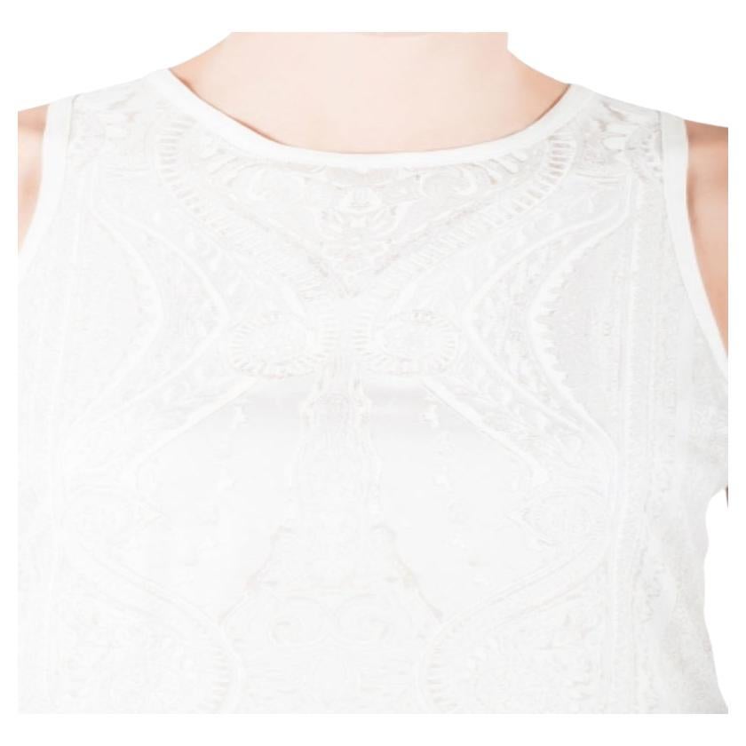 Le débardeur reflète l'élégance et la sophistication. Cette pièce de Roberto Cavalli présente un motif imprimé à supports mixtes qui rehausse l'attrait de la création. Taillé dans un mélange de soie, il vous offrira une coupe souple.
