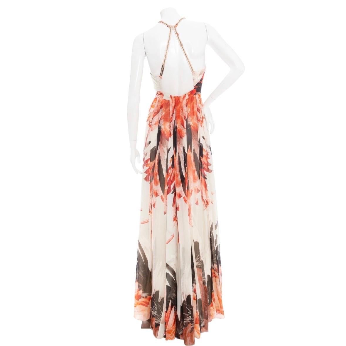 Roberto Cavalli Off White Silk Feather-Print Halter-Neck Maxi Dress

Spring2014
Ivory/Red/Pink/Orange/Black
Abstract feather print
Halter neckline with front keyhole
Racer back straps with button fastening
Snake chain trim along neck and back