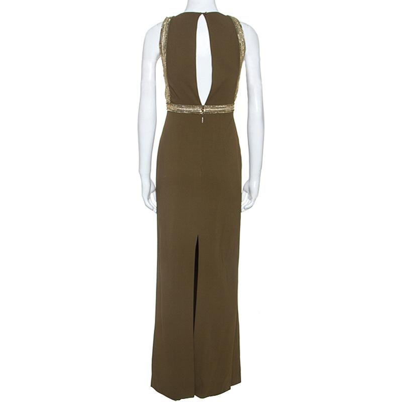 This stunning maxi dress by Roberto Cavalli will make sure you are the talk of the town. Crafted from a blend of quality materials, it comes in a stunning shade of olive green. This sleeveless dress has a lovely silhouette and exudes class and