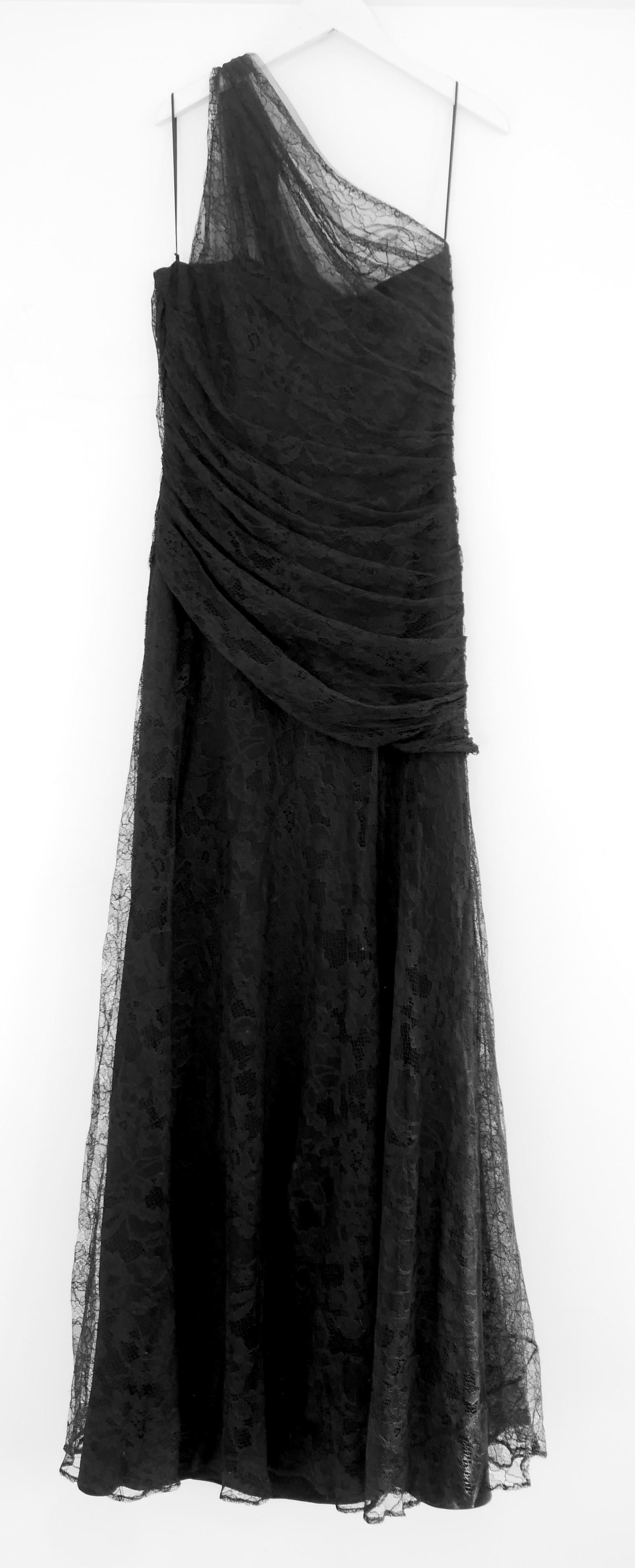 Gothic gorgeous Roberto Cavalli one shoulder lace gown. Bought for £2540 and new with tags, hanger and dustbag. Made from super fine, delicate slightly sparkling black lace, it has a super flattering boned and draped bodice, fluid maxi skirt and