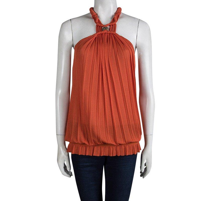 This stretch knit piece from Roberto Cavalli will add instant colour and glamour to your wardrobe. The halter knots and twist knit neckline on this top is further accentuated with a crystal embellished jewel at the centre to add bling and glam to