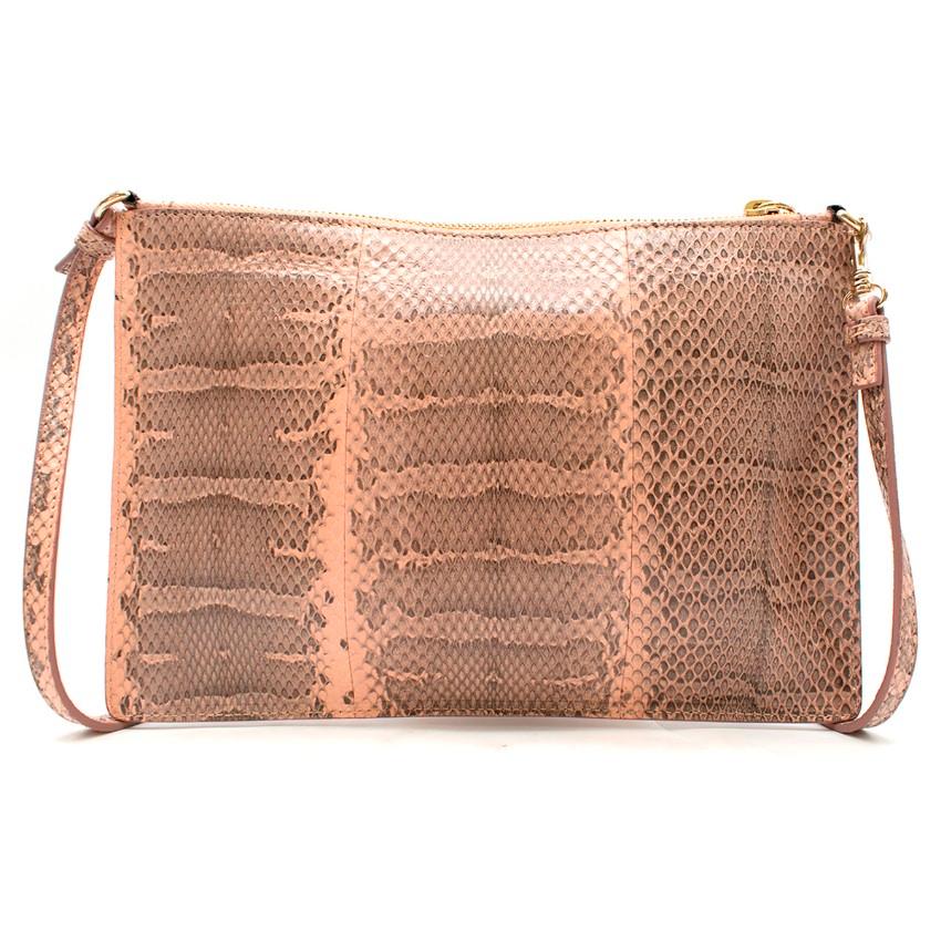 Roberto Cavalli Peach Python Shoulder Bag

- Peach python cross-body bag
- Zip fastening
- Gold-tone hardware
- Charm zip pull
- Leopard print fabric lining with an internal zip pocket and leather card holder


Please note, these items are pre-owned