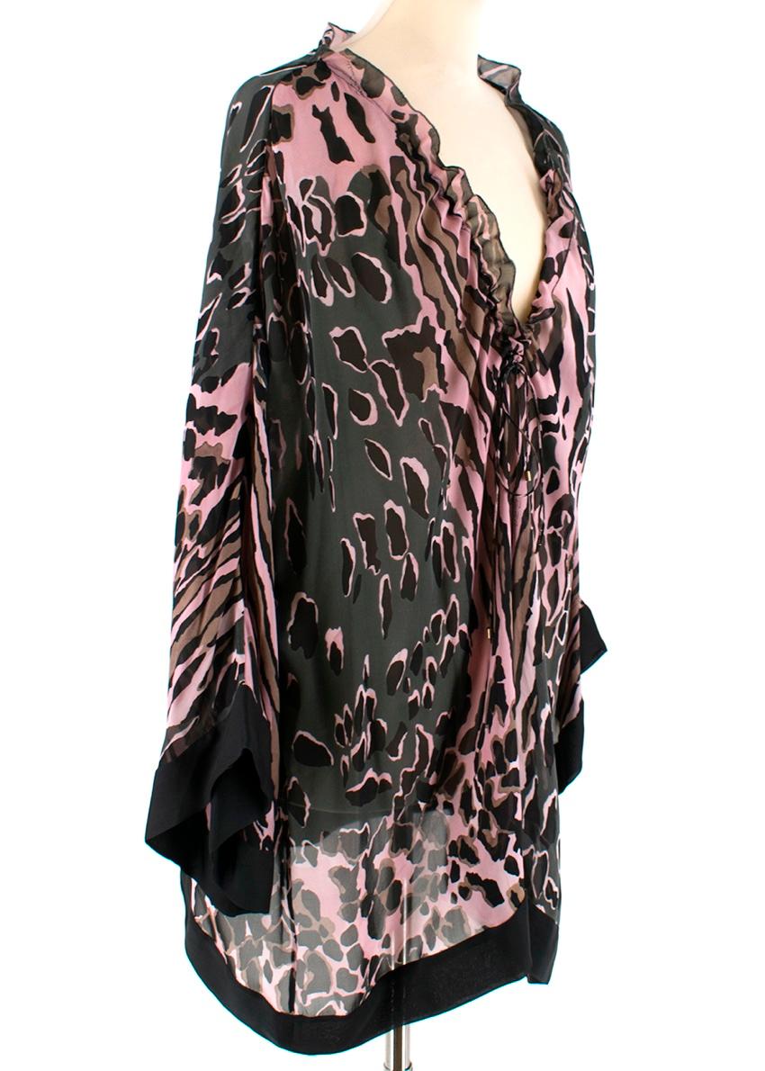 Roberto Cavalli Pink and Grey Animal Print Silk Blouse.    RRP £985

- Tie-up string fasten, ruffled neckline
- Bow feature to front

100% Silk 

Made in Italy

Dry clean only

Please note, these items are pre-owned and may show signs of being