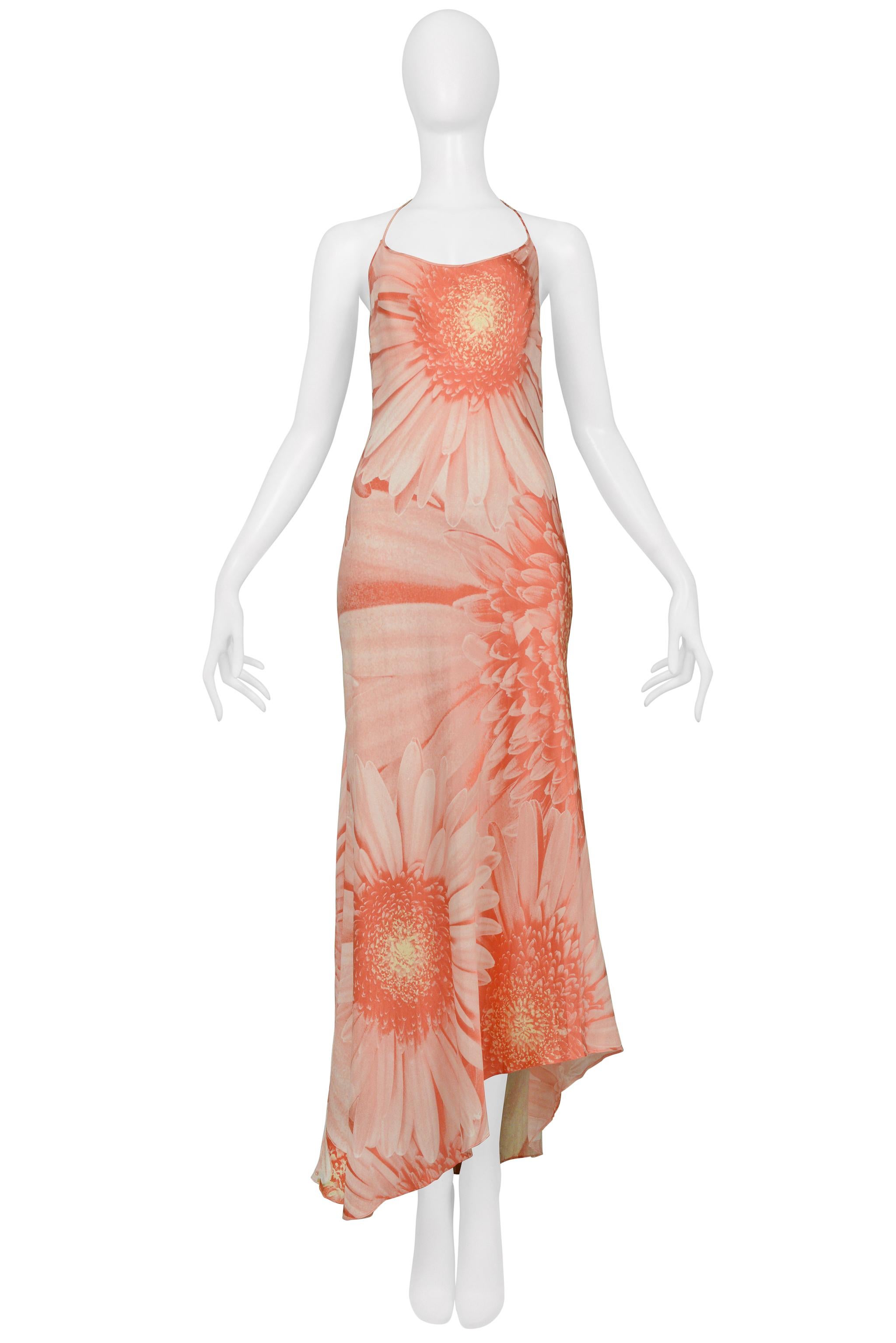 Resurrection Vintage is excited to offer a vintage Roberto Cavalli pink slip dress featuring decorative daisy floral pattern, open back, tie closure with gold beads, asymmetrical hem, and maxi dress length. 

Roberto Cavalli
Size Medium
100%