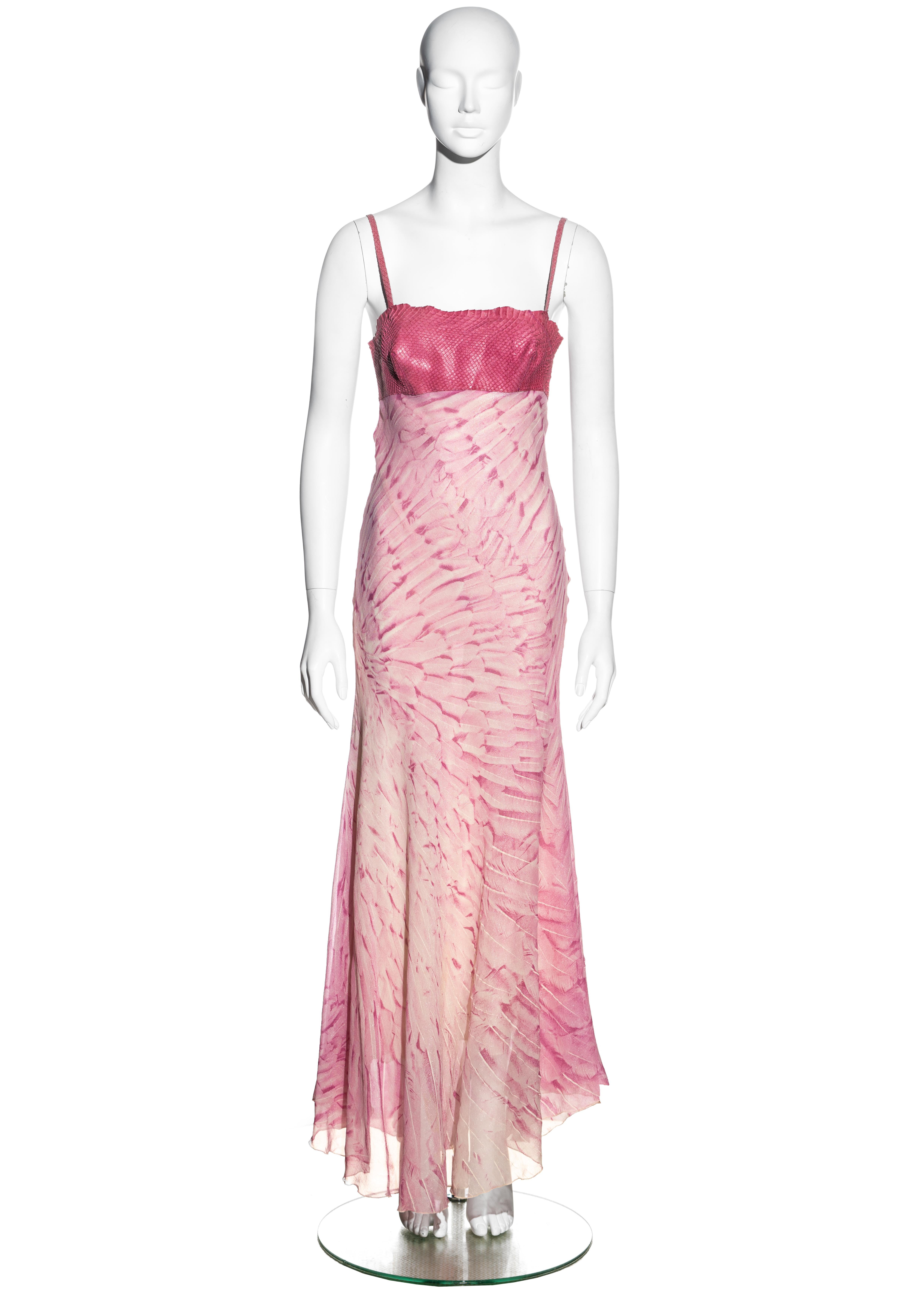 ▪ Roberto Cavalli pink silk evening dress
▪ 100% Silk, 100% Leather
▪ Snakeskin bust with spaghetti straps 
▪ Pink feather print 
▪ Hook fastenings at centre back 
▪ Asymmetric hemline 
▪ Size Small 
▪ Spring-Summer 1999
