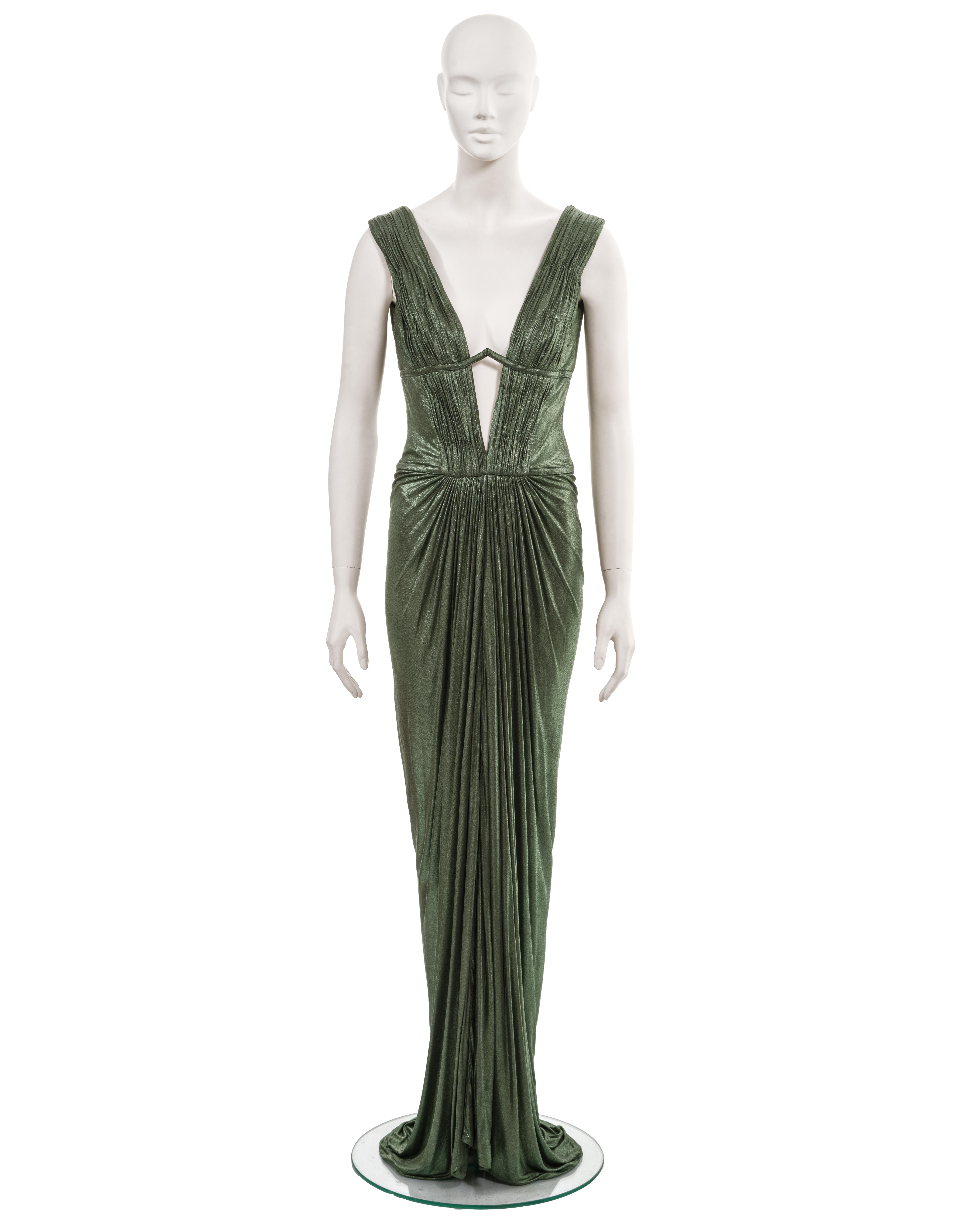 ▪ Roberto Cavalli 'Cleopatra' evening dress
▪ Fall-Winter 2007
▪ Sold by One of a Kind Archive
▪ Metallic green cupro jersey 
▪ Finely pleated bodice 
▪ Plunging v-neck with underwire bra detail
▪ Floor-length draped skirt with vertical pleats on